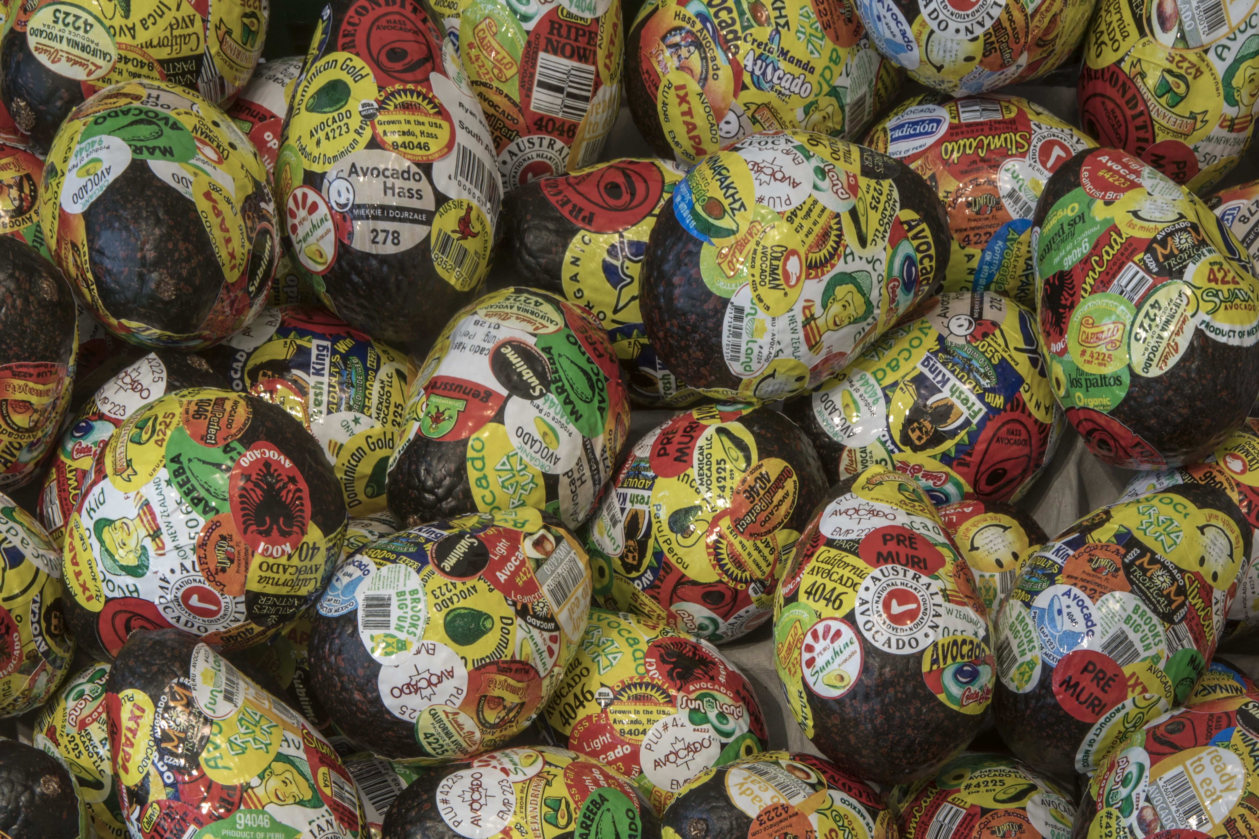 Detail, Adriana Martinez, Tutti Frutti Market, 2018, plastic fruits, stickers, six plastic crates, wood, mesh, 7' x 4' x 4.'