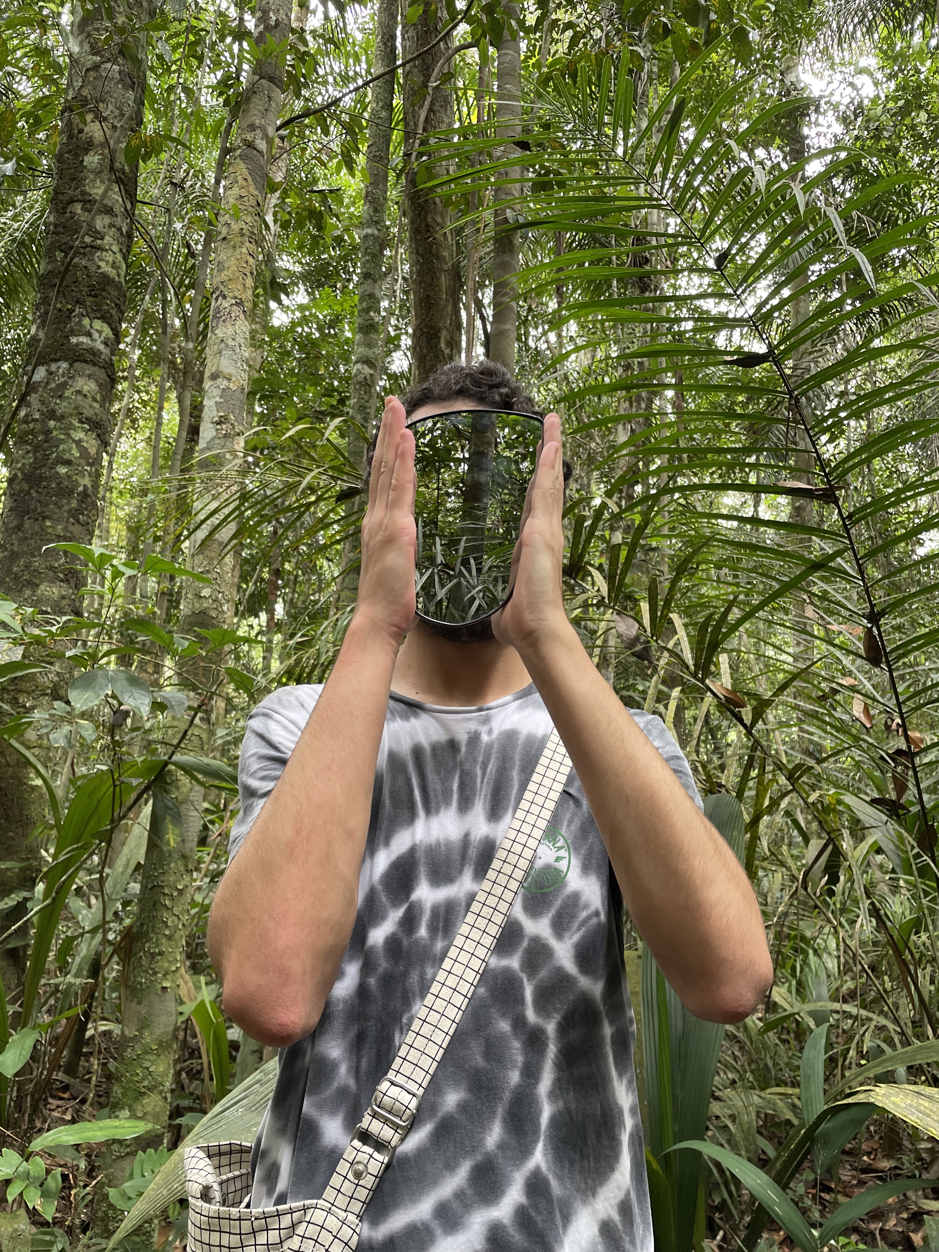 Found rearview mirror (portrait with amazon rainforest), 2022, with Polina Shklovskaya