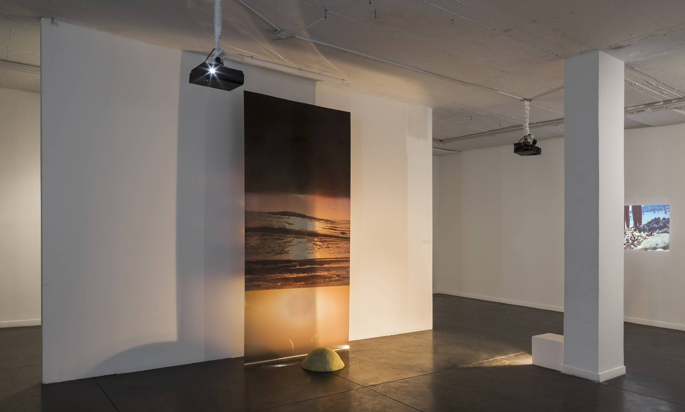 Distorted Sun, 2018, Digital print on a Transparency, 285x140 cm, Plasticine Floor Object, 35x60x60 cm