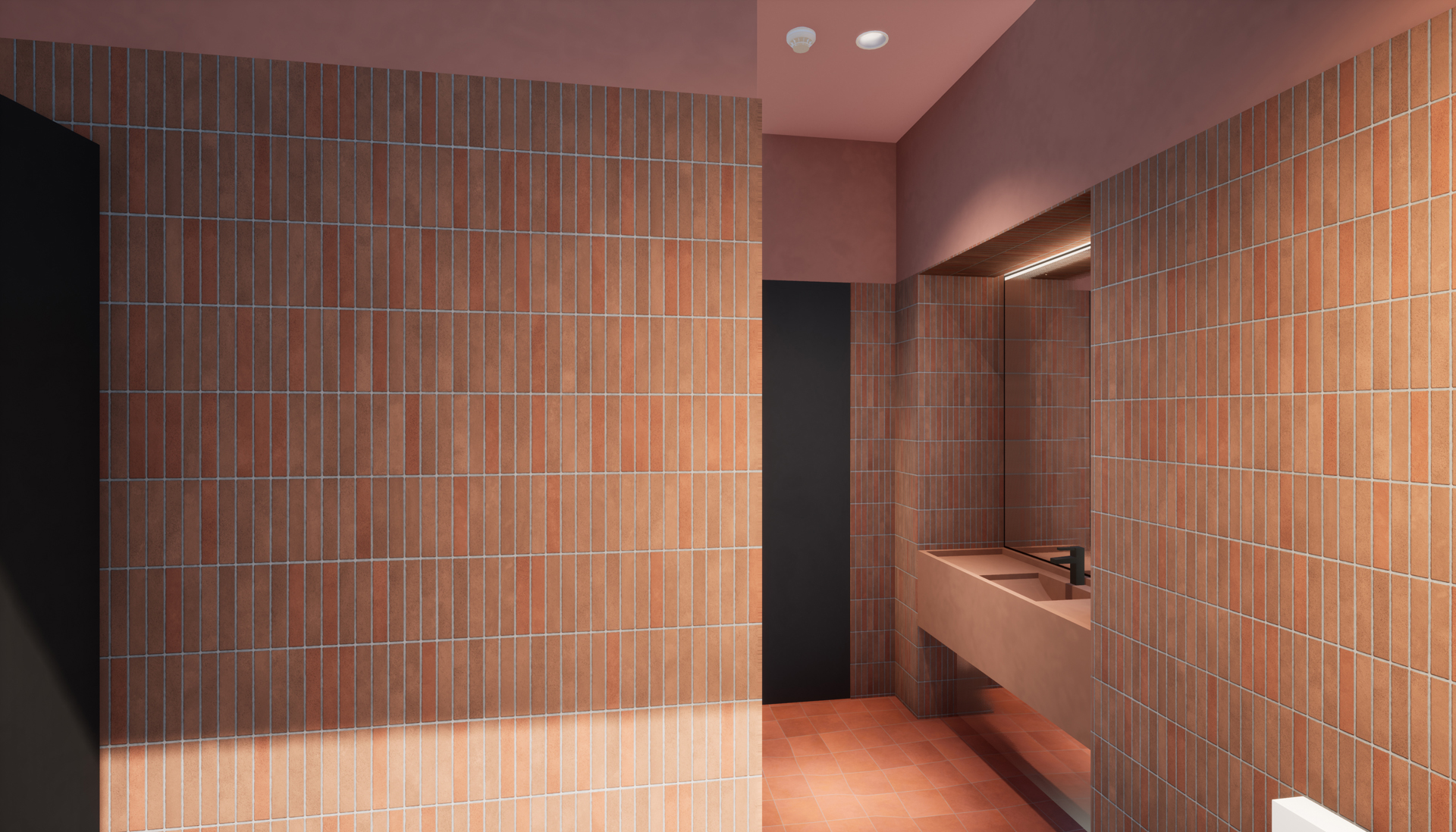 Transposing the key exterior architectural element, the brick facade of the campus hub, is addressing the bathroom finishes