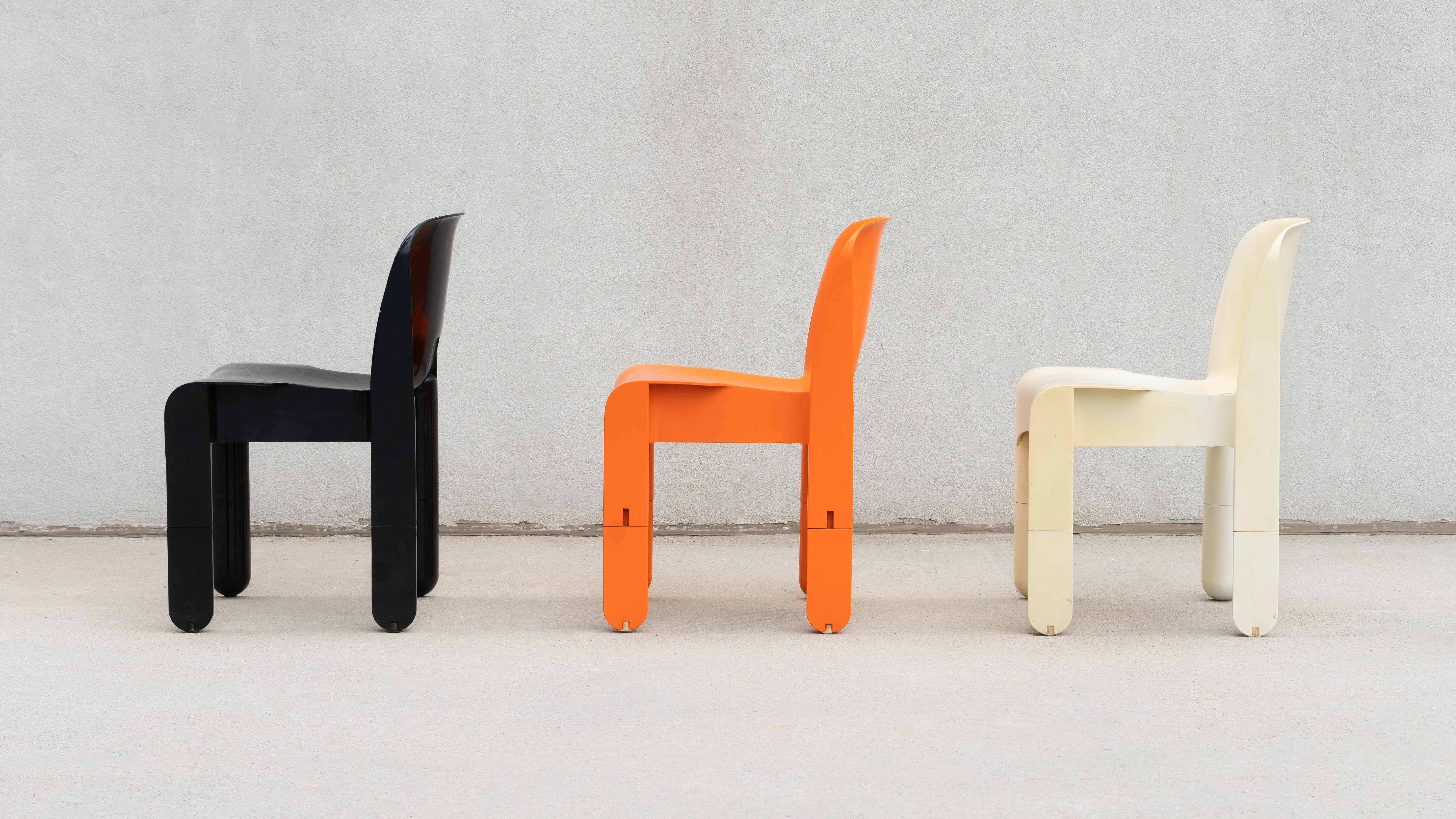 SWEETERFAT KARTELL UNIVERSALE CHAIR PRE PRODUCTION ORANGE BLACK WHITE PLASTIC SPACE AGE CHAIR DESIGNED BY JOE COLOMBO 