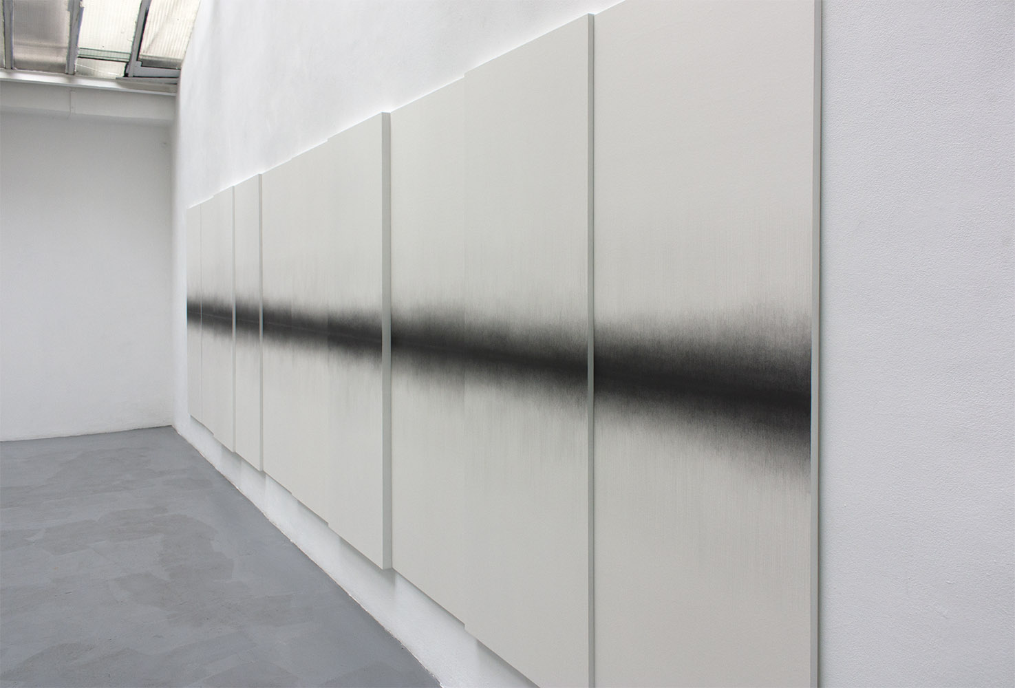 Sans titre (polyptyque), 2015graphite sur papier marouflé sur bois, 180x700cm