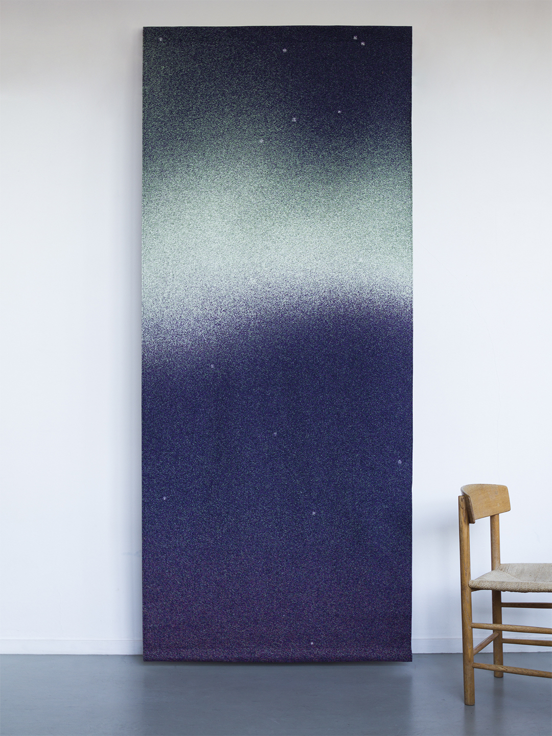 BorealisCurtains of light float in the dark northern skies. The window coverings of the conference room of the Fogo Island Inn echo these ghostly veils. 