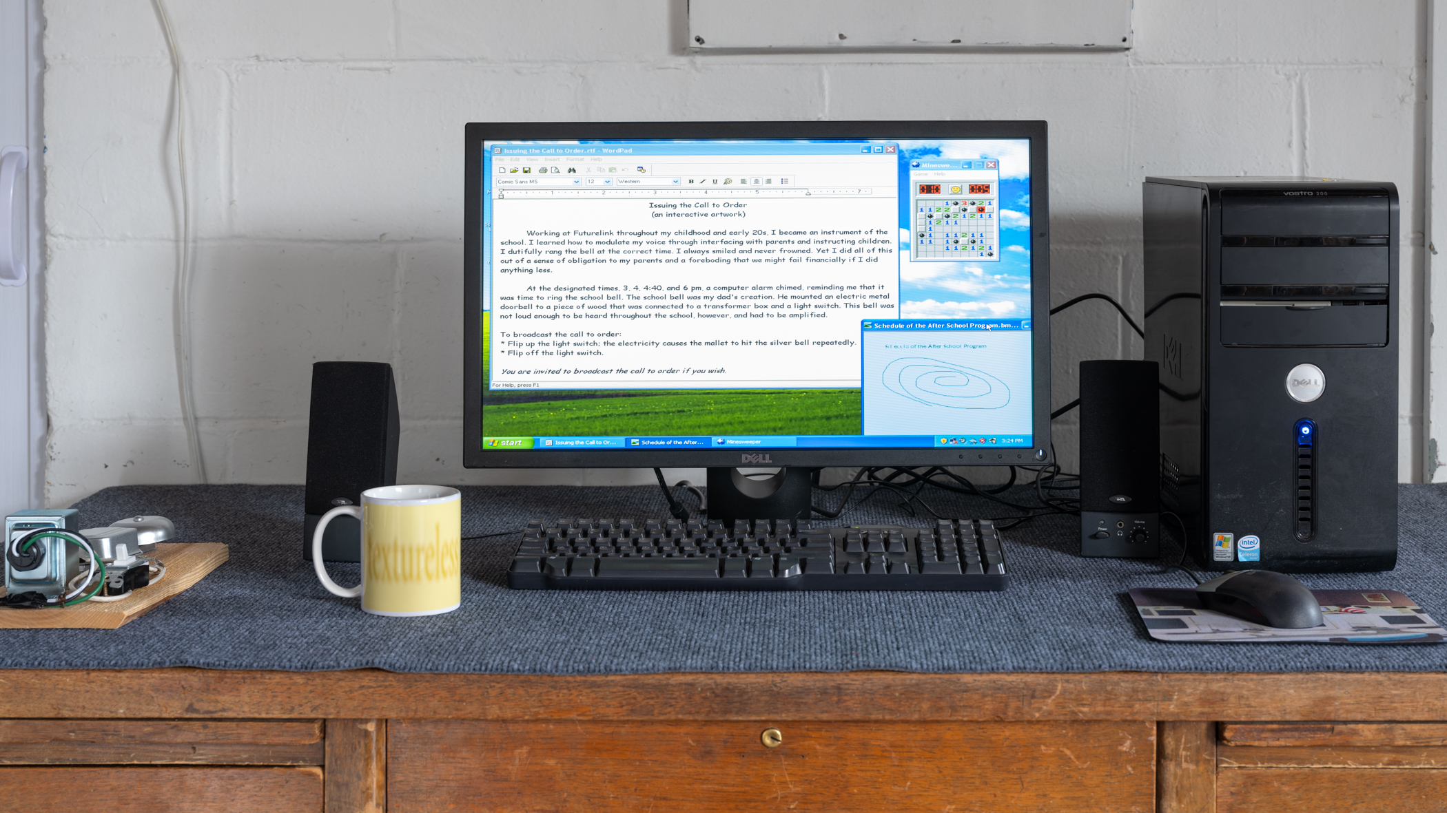 Issuing the call to order, electric bell, transformer box, light switch, electrical plug, Dell computer, keyboard, mouse, and speakers on loan from the Media Archeology Lab, Counterpath desk, carpet, 60 in. x 50 in. x 34 in. (2025)