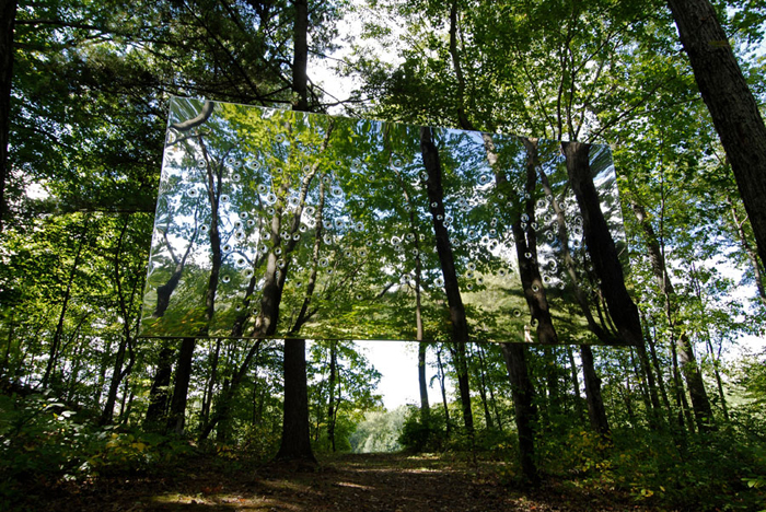 Gunshot Lanscape (spring view), 2003, mirror-polished double-sided stainless steel panel suspended by aircraft cable, 46x94 in, Collection of The Fields Sculpture Park, Ghent, NY