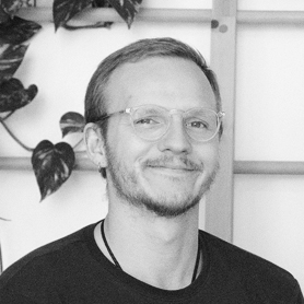 A black and white photo of Thomas