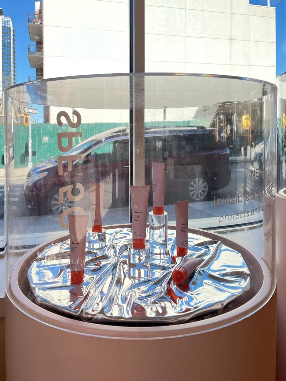 Creative Display for Invisible Shield SPF 50, Glossier