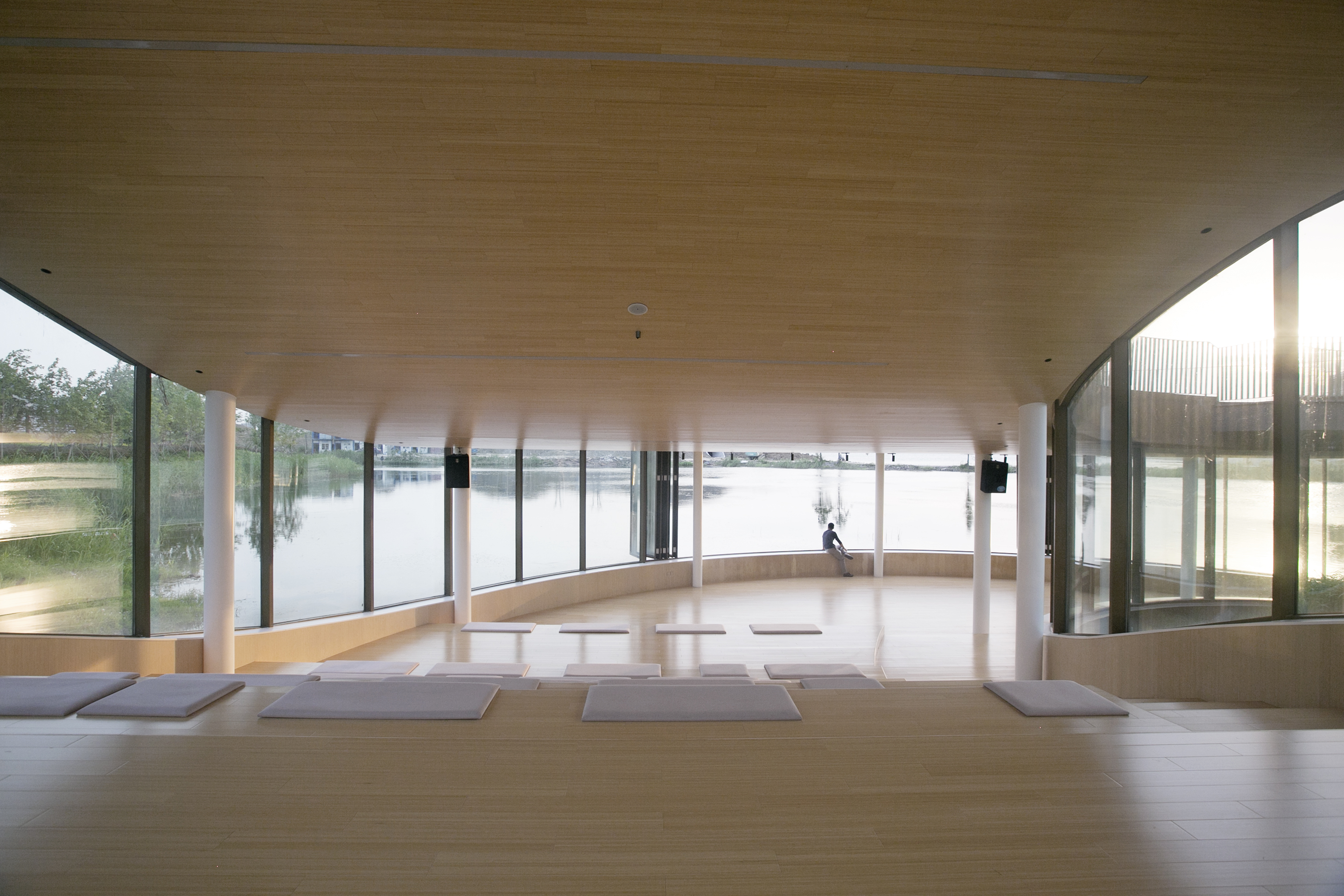 While the whole spaces leans towards the water, the patio offers a glimpse of the sky.