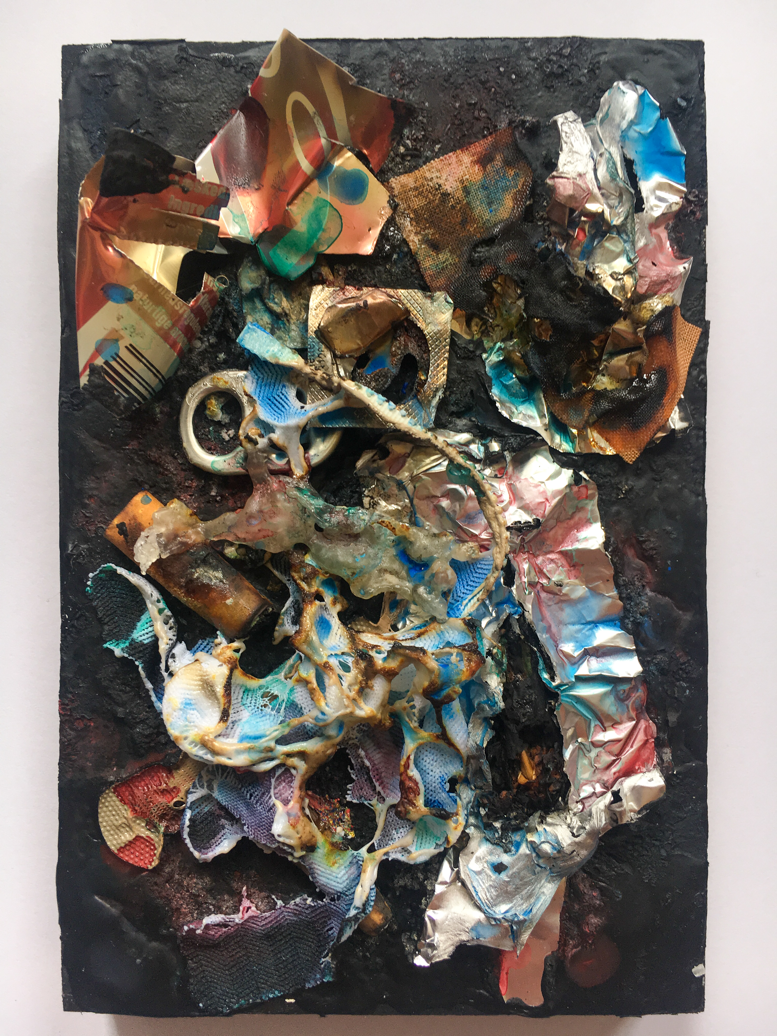 Materials | paint, salt, can of Coke, plastic, ash, cigarets, fabric, band aids