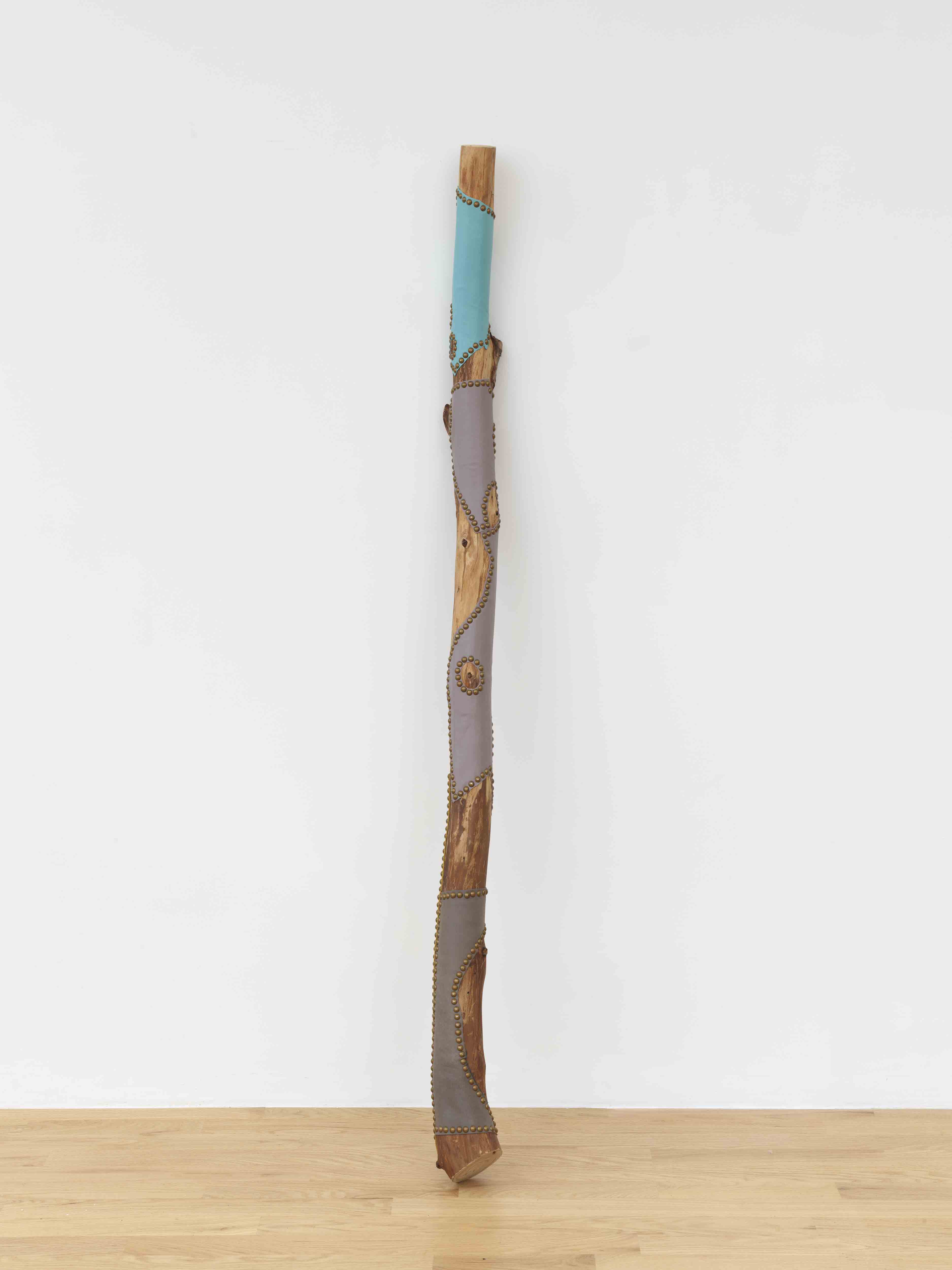 Jean Shin, S.O.S. #3, 2021, salvaged hemlock branches from Olana State Historic Site, deadstock leather, upholstery tacks, 77 x 6 inches (195.6 x 15.2 cm). Photo by Elisabeth Bernstein.