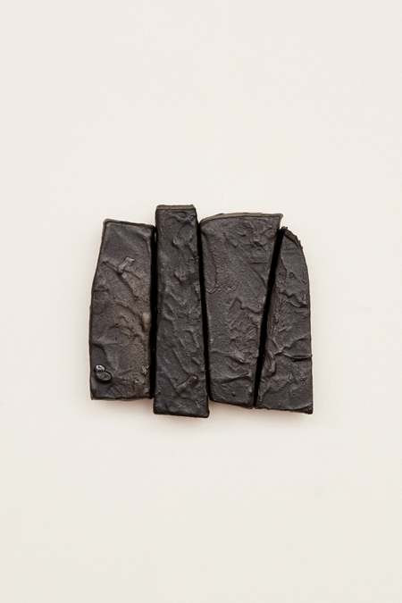 COAT OF ARMS #5Clay, tar, graphite.14 x 12cm.2022