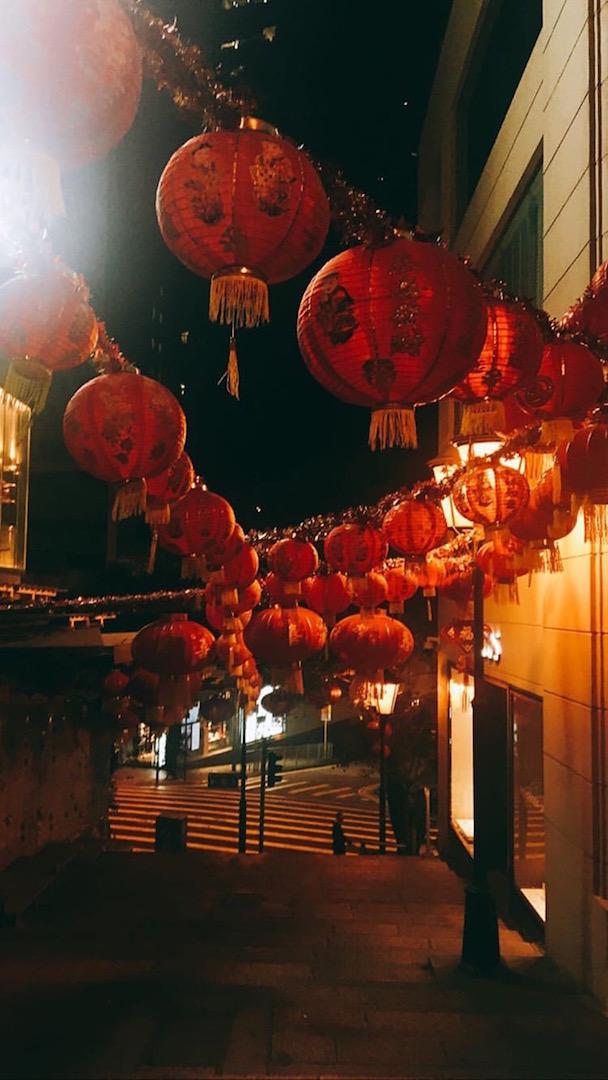 Dashes and sparks of red back lights lined steep streets © Yoshika Kon