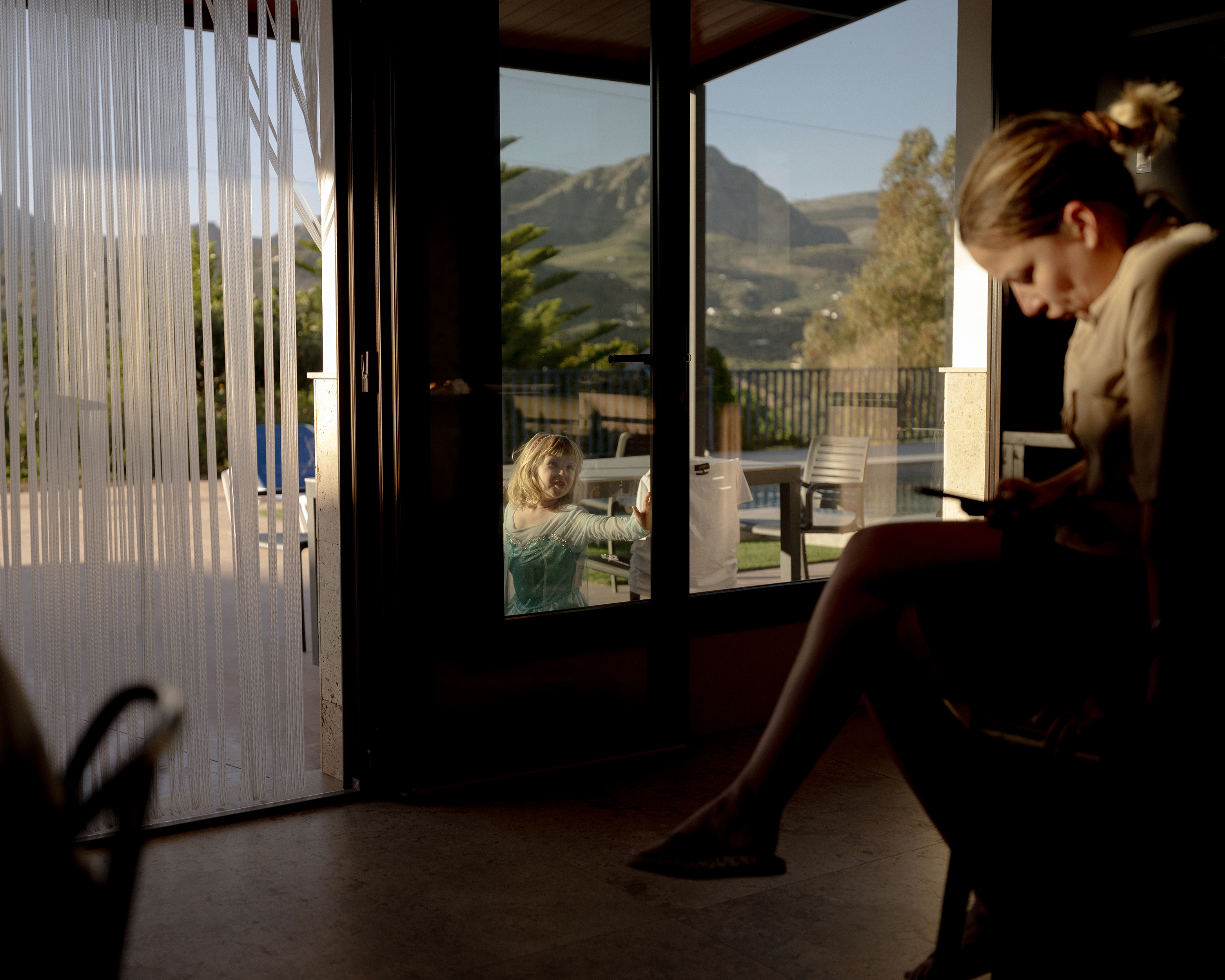 Mila dressed as Elsa, performing Let It Go