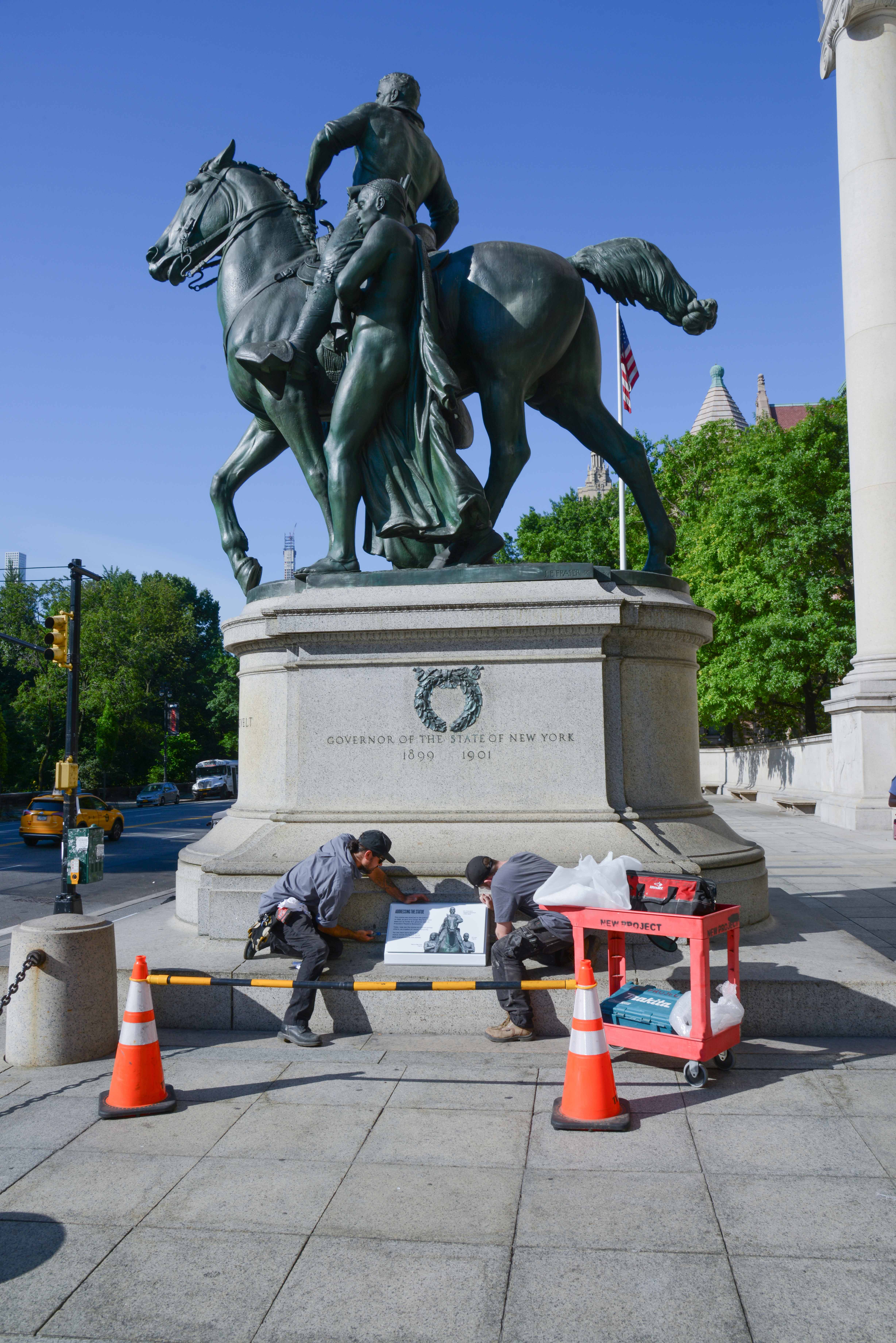 Installation of outdoor signage directing visitors to the free, online version of the show.