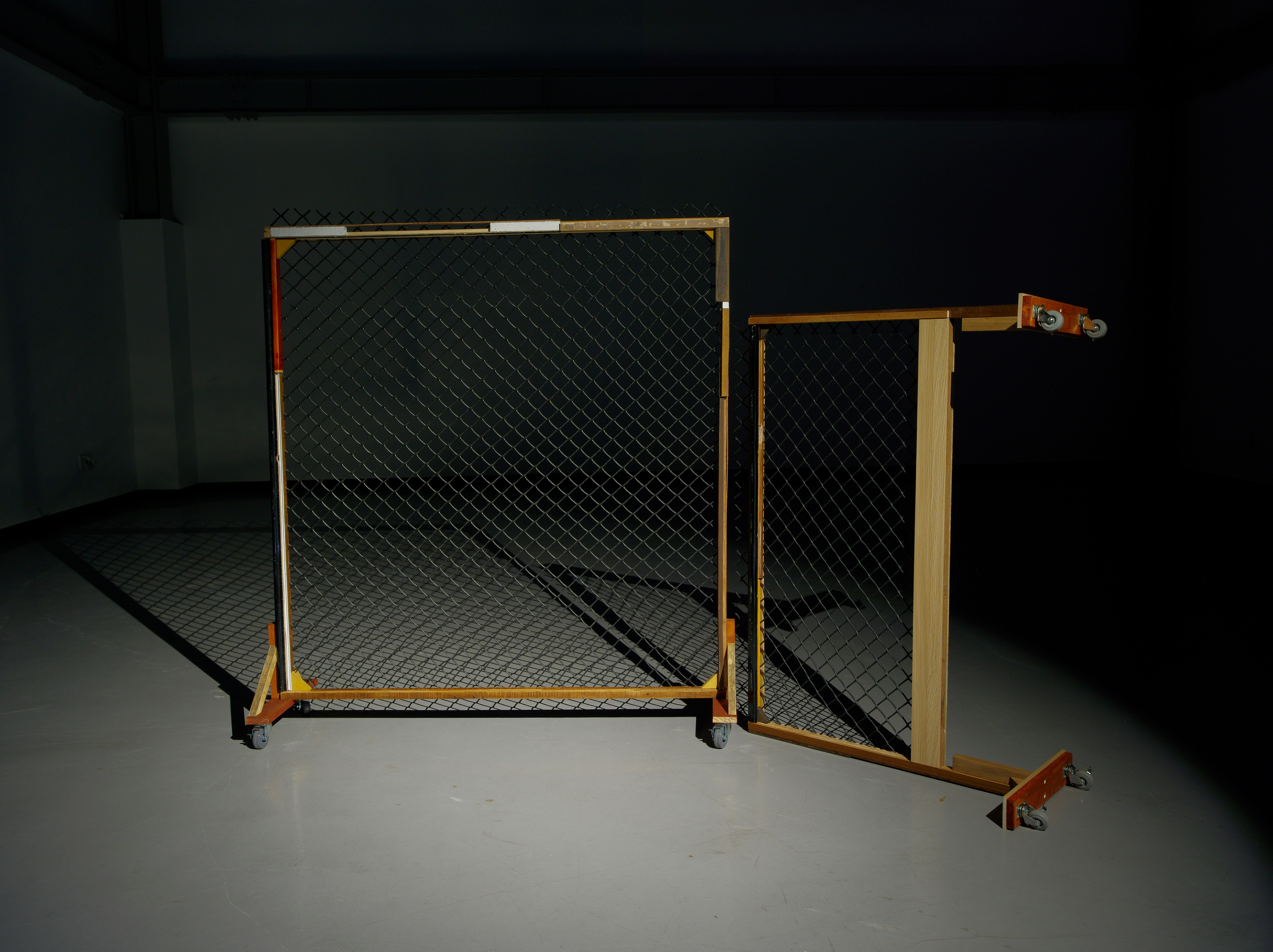 Running Fence / Found object, fence, wheel,  Dimensions Variable, 2018