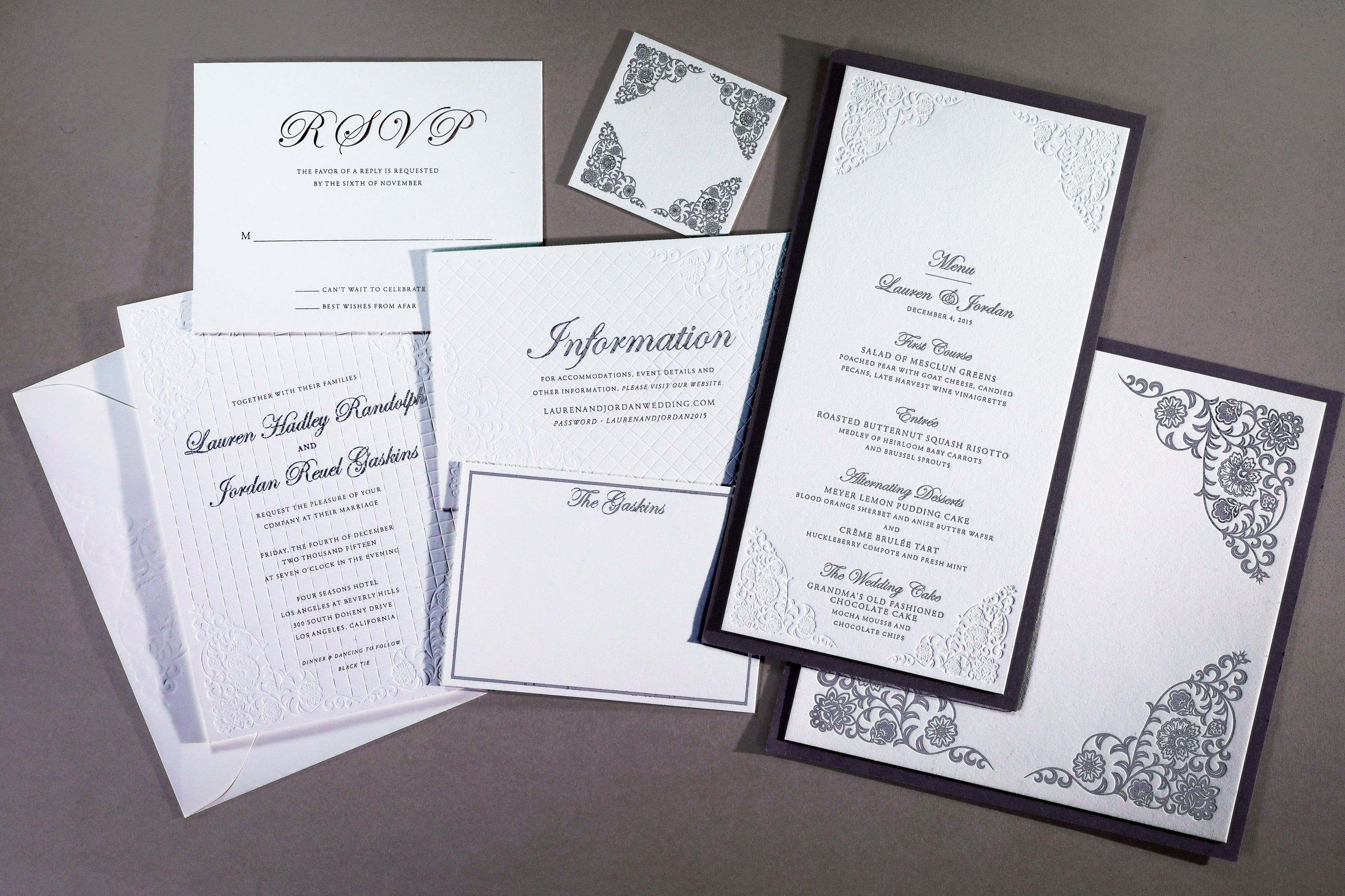 Lauren & Jordan wedding invitation Foil stamping in silver, letterpress in gray and blind impression on pattern.Menu and table cards mounted on steel gray.Paper and envelopes Savoy in brilliant white