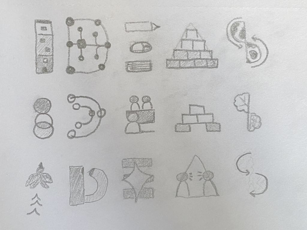 Initial sketches of IDEAS icons in pencil, showing the other ideas we came up with before finalising