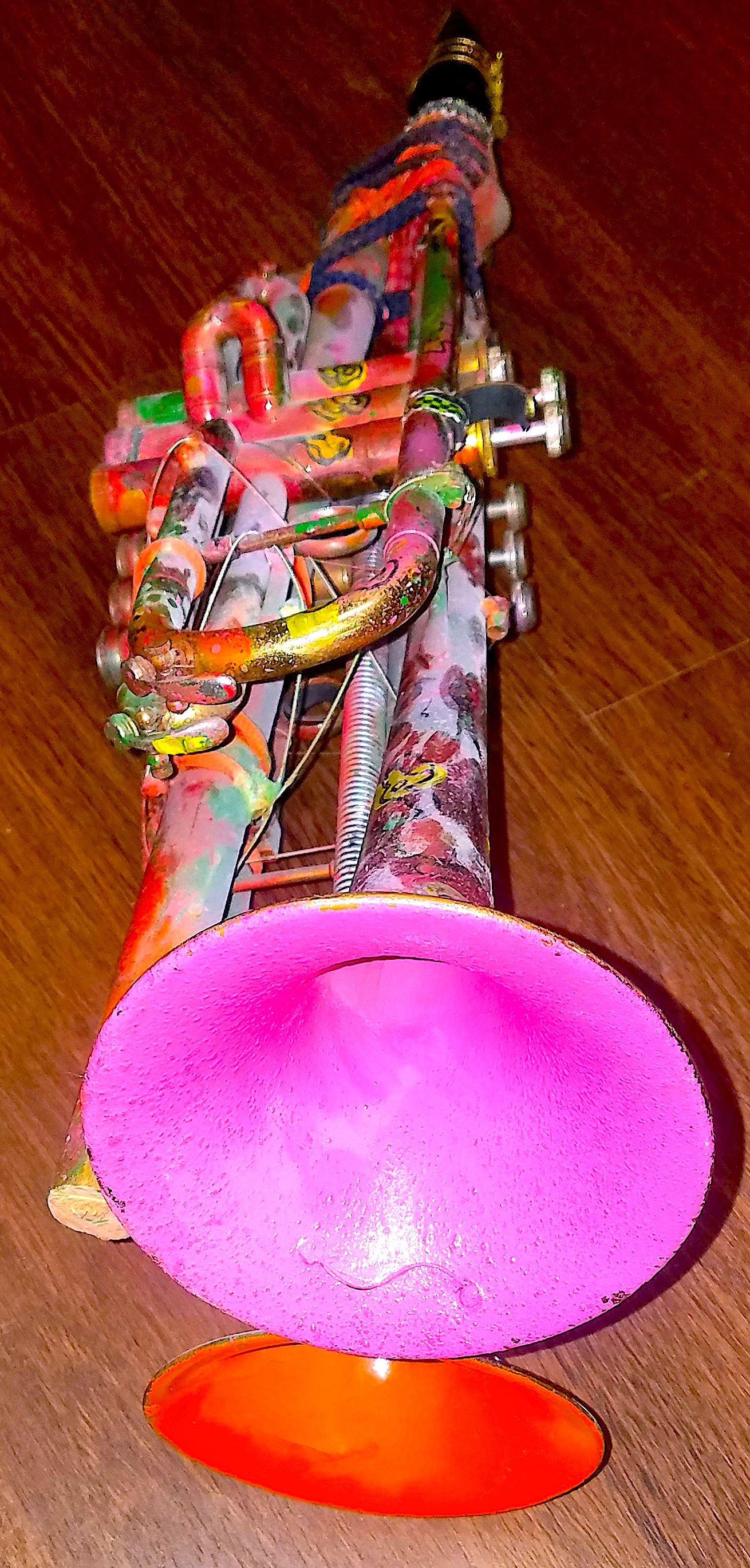 "The Hell Rake" Two trumpets welded together to play in unison with one mouth piece, strings & springs attached as well, one bell smooth other with rough texture for difference in tone 2018 