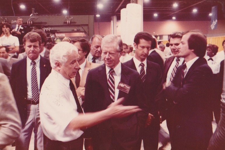 Bert with former US President Jimmy Carter. Known contemporarily for his work building homes and furniture through Habitat for Humanity, here President Carter can be seen visiting a woodworking industry trade show, which Bert helped organize as a founder of WMIA.