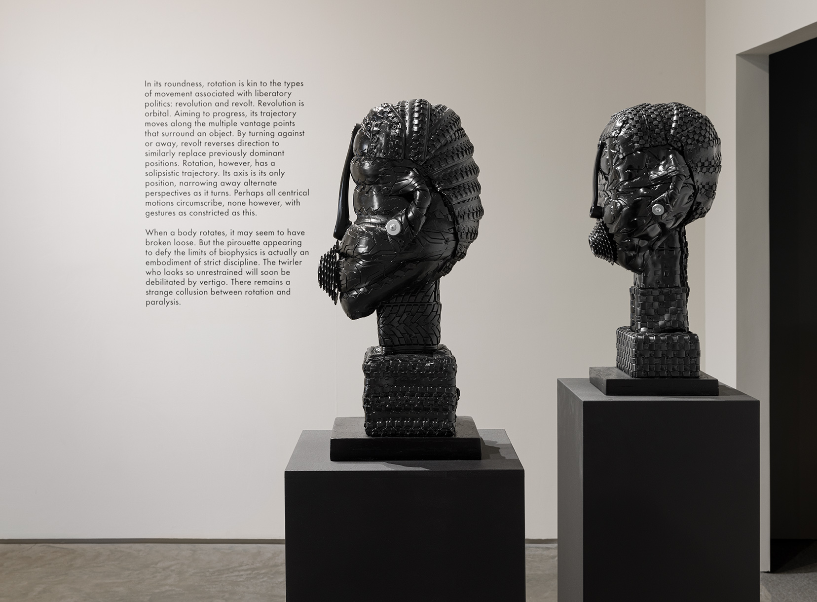 From left to right: Kim Dacres, "Mikayla II," 2022. Recycled auto and bicycle tires, wood, screws, bicycle parts, washers, and spray paint mounted on painted oak, 25 3/4 x 13 1/2 x 11 1/2 inches; Kim Dacres, "Mikayla I," 2022. Recycled auto and bicycle tires, wood, screws, bicycle parts, washers, and spray paint mounted on painted oak, 24 x 12 3/4 x 11 1/2 inches. Photo by Etienne Frossard.