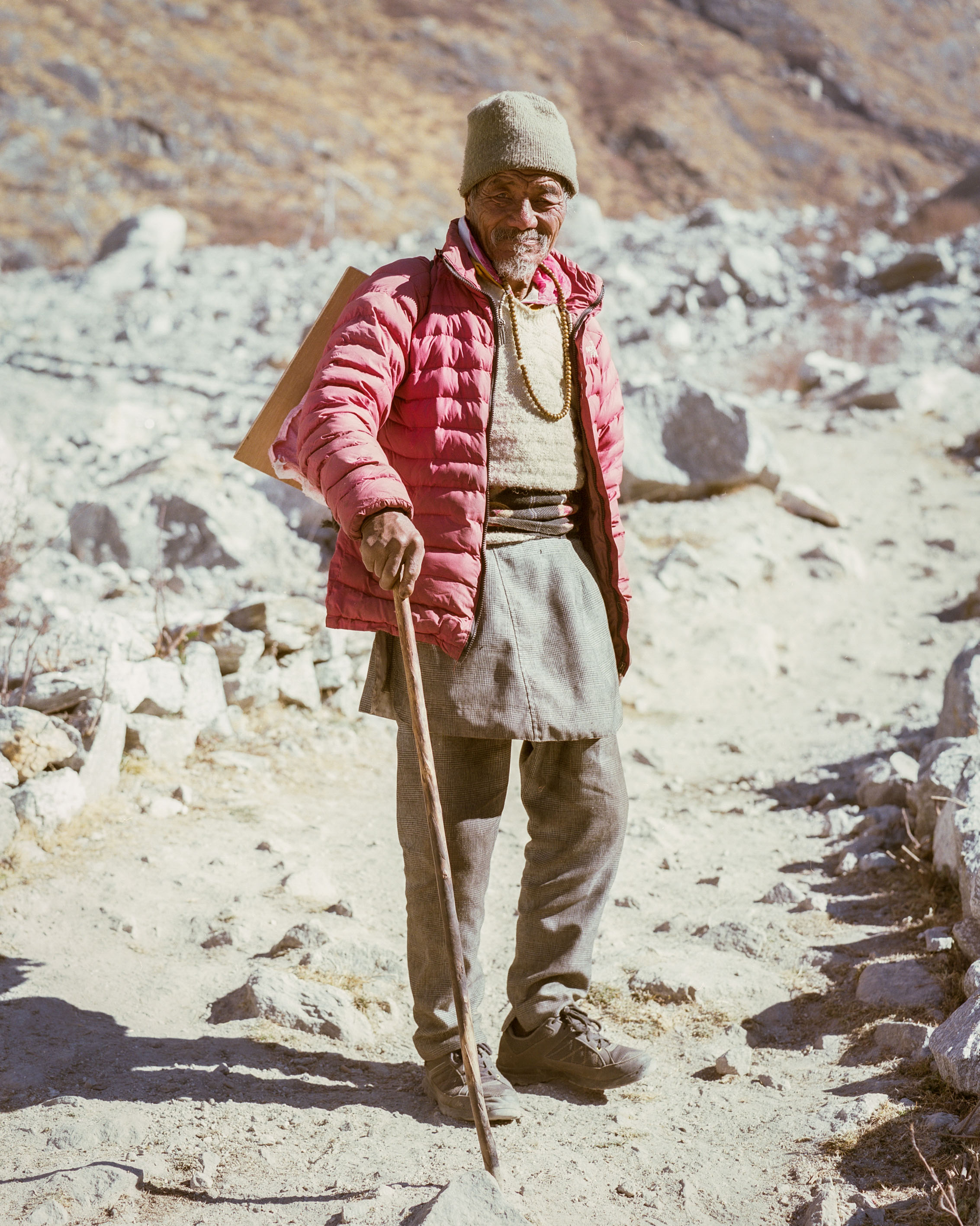 A path has been made over the rubble from the stone and snow avalanche. This man said he walks everyday this way on top of where his relatives are buried.