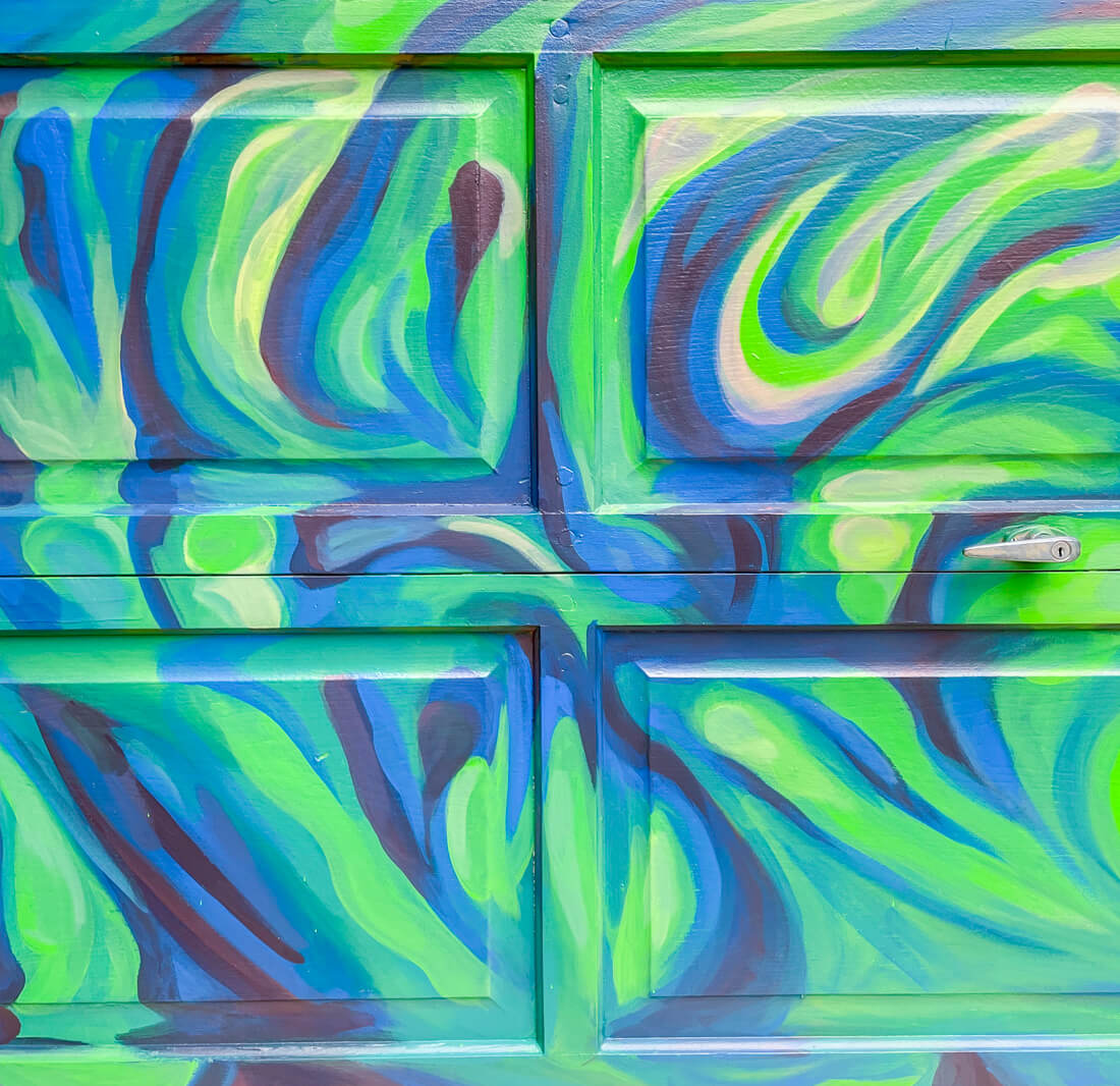 green psychedelic floral exterior garage mural