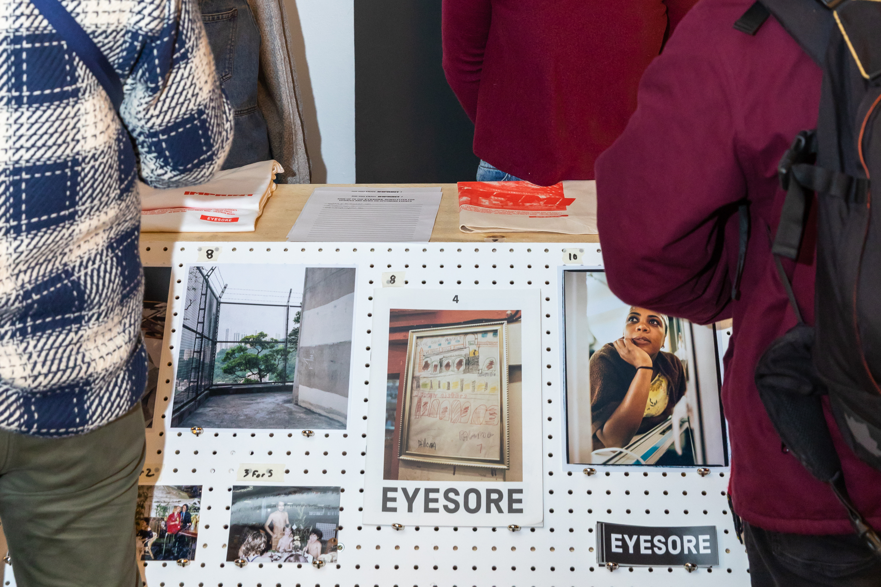 > The EYESORE stall at Imprint featuring prints from A. Kurunis and P. Walker