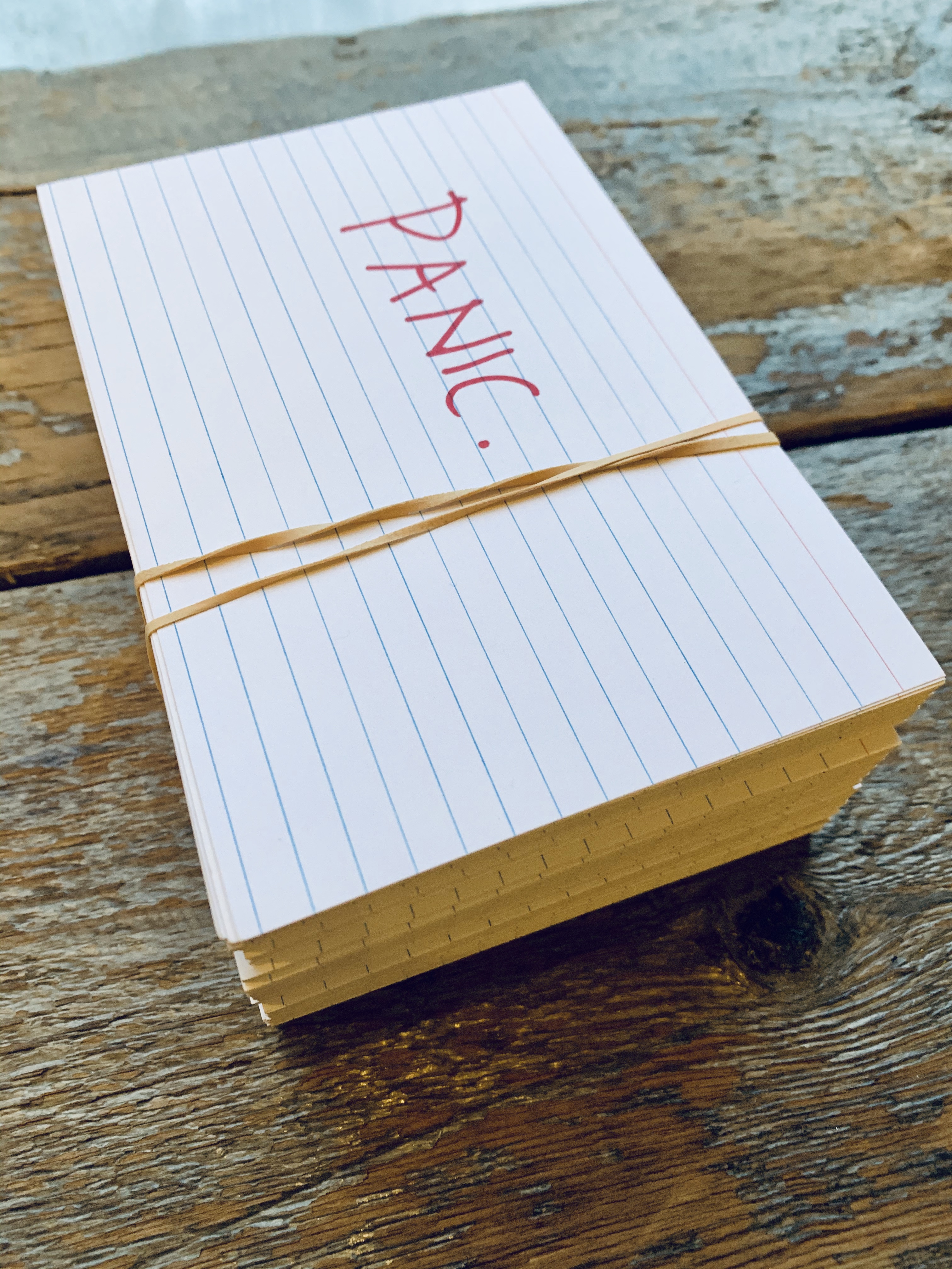 1/1 — PANIC. PANIC. PANIC...  The number of index cards references the number of days from the United States Presidential Democratic Debate held on Friday, February 7, 2020, until the United States Presidential election scheduled for Tuesday, November 3, 2020. This work was donated to the AIR Gallery's Fe-Mail exhibition/fundraiser in February, 2020. Two hundred and seventy 4" x 6" index cards, sharpie, rubber-band, 2020.