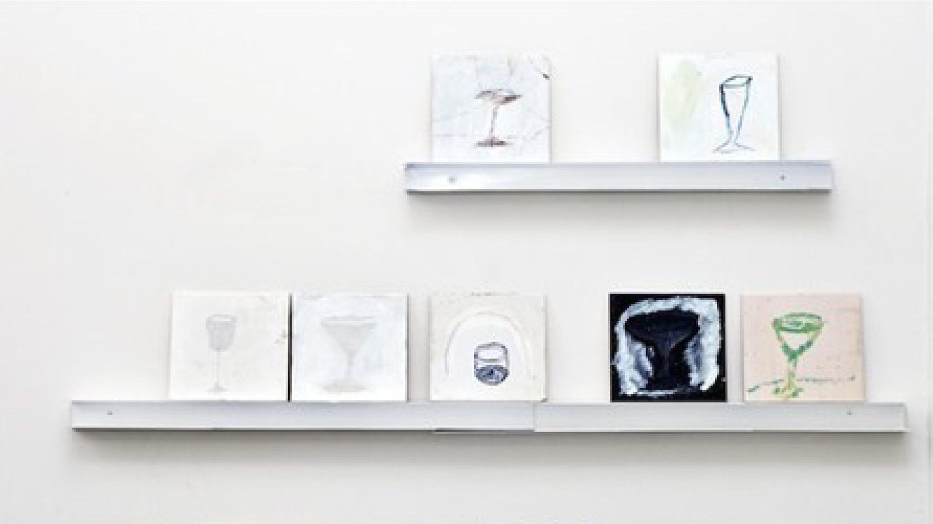 ID: Two rows of small square canvases on wooden picture-rails against a white background. Each canvas depicts a sketched outline of a different type of drinking glass including a tumbler, martini glass, wine glass and beer stein.