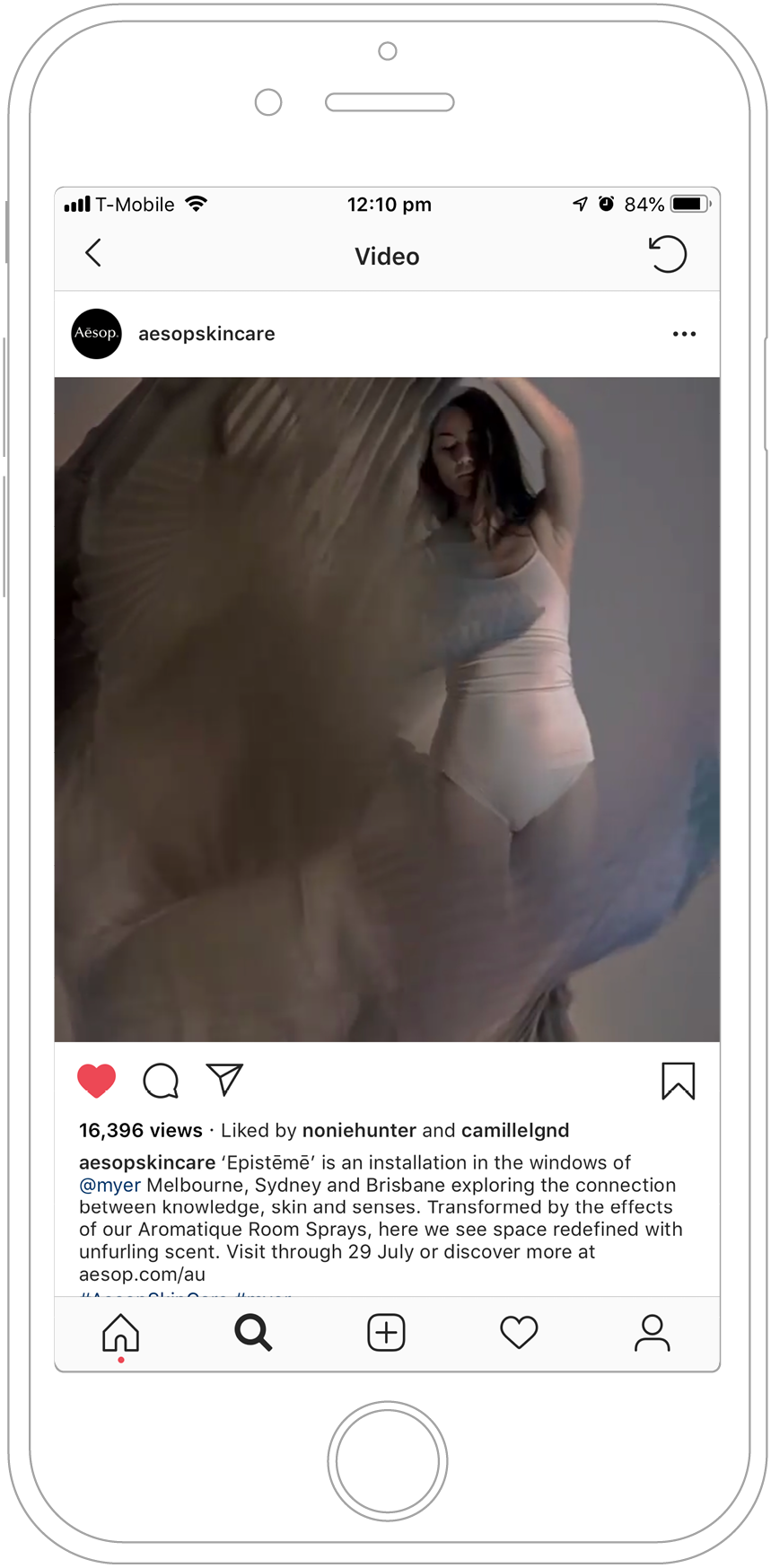 An instagram post featuring campaign imagery of a dancer surrounded by flowing, transparent material.