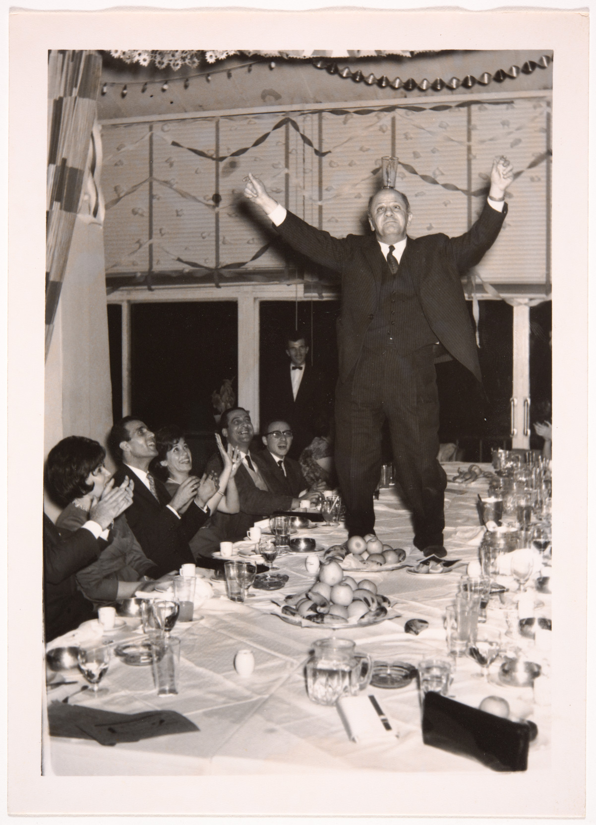 Snapshot at a dinner party, taken by an unidentified photographer in Syria, 1950 – 60, gelatin silver developing-out paper print, 0159ko00005, 0159ko. Haifa Kocache Collection, courtesy of the Arab Image Foundation, Beirut