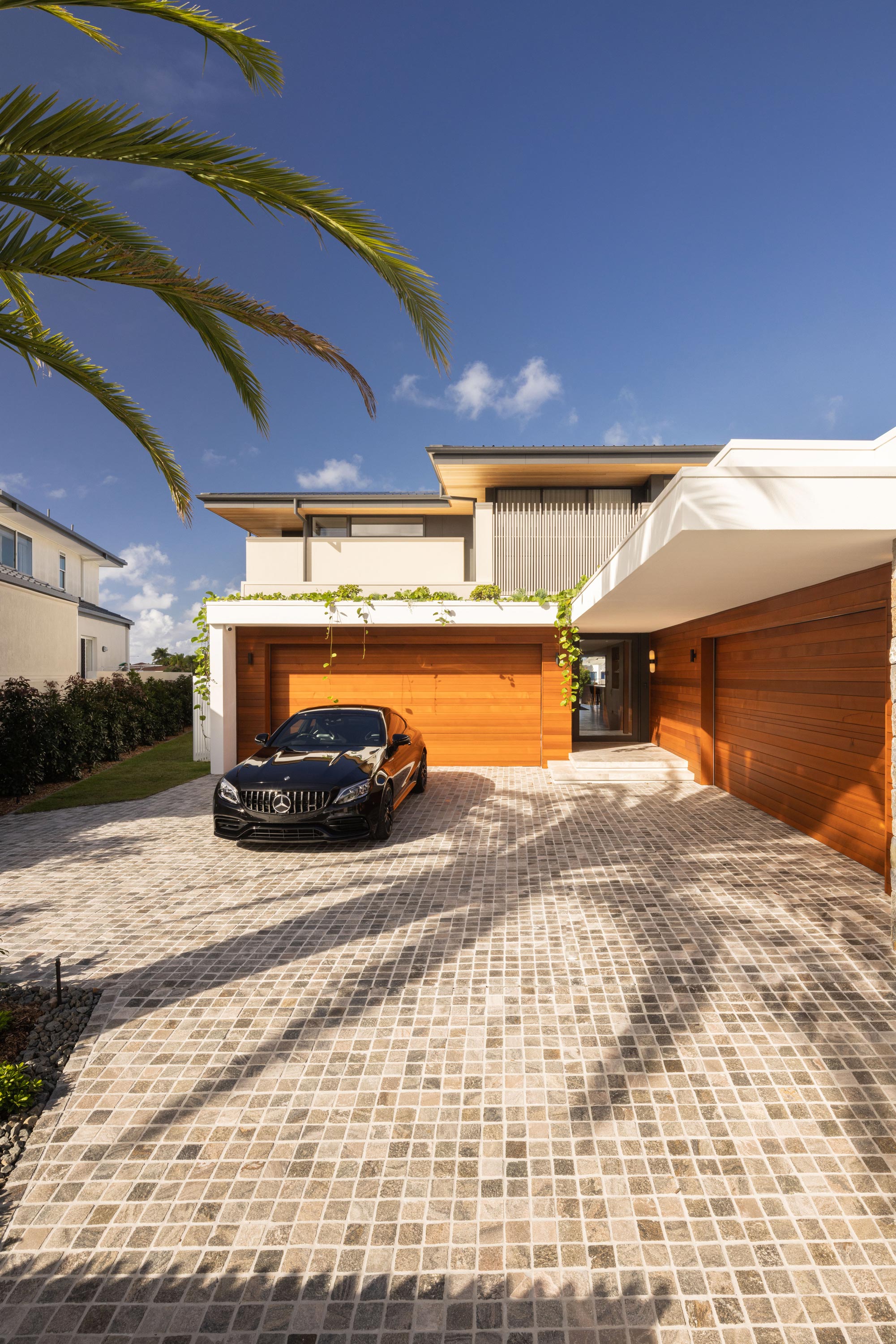 Front entry view of contemporary luxury residence in Mermaid Beach, Queensland