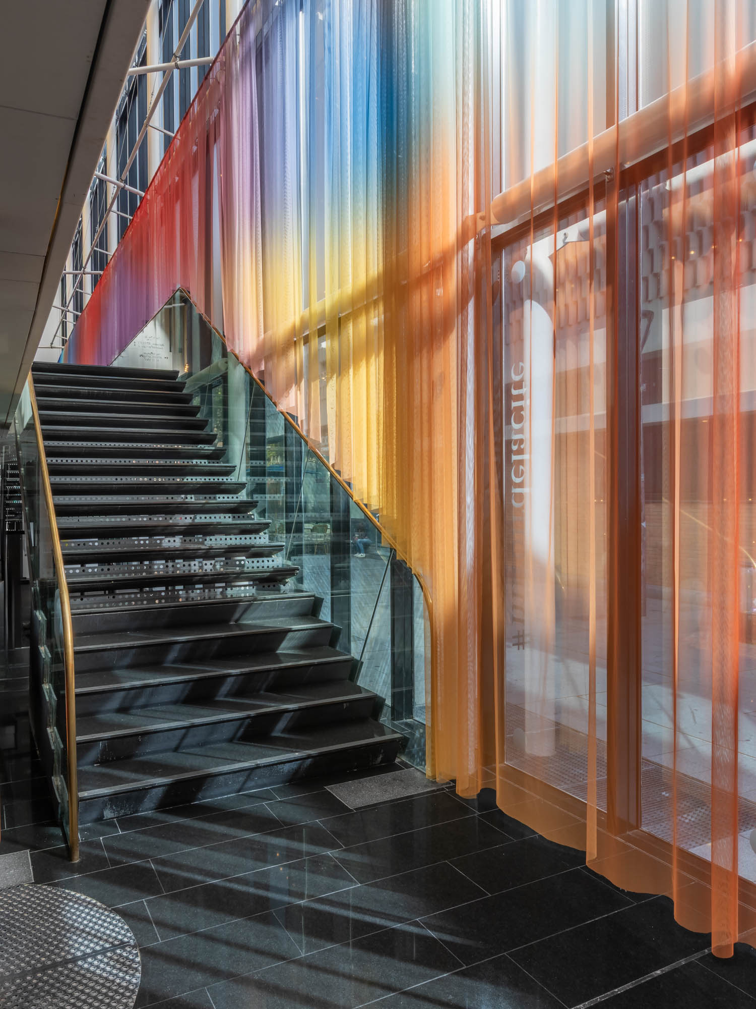 How to screen Shakespeare’s Twelfth Night, chromed steel and printed tulle, 600x2600 cm, 2025. 