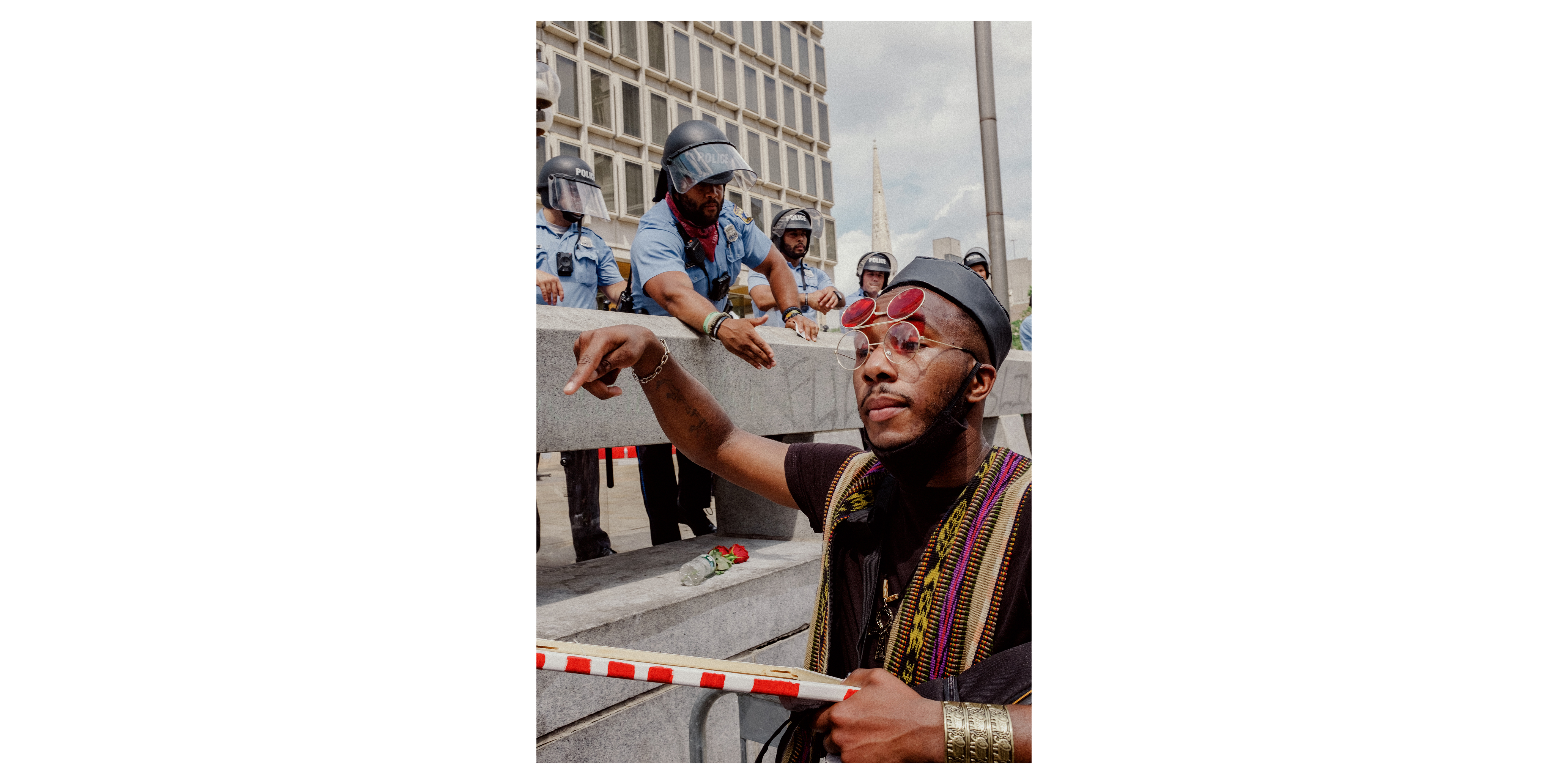 Protester and cop at Municipal Building, Philadelphia, 2020