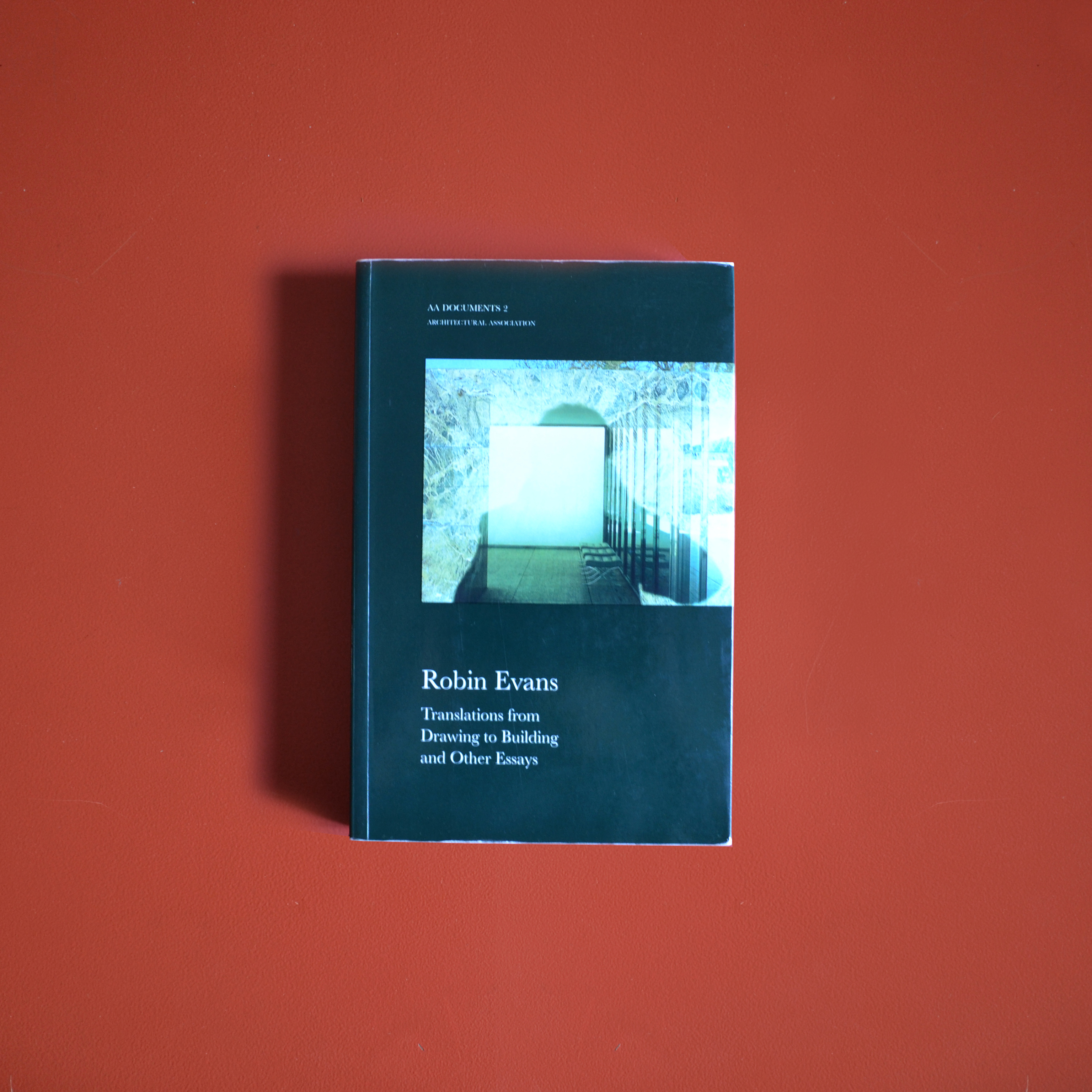Robin Evans Translations from Drawing to Building and Other Essays, Cambridge: The MIT Press, 1997Robin Evans was a historian whose writings covered a wide range of architectural concerns: society's involvement in building types; spatial relations; aspects of geometry; and modes of projection. This text brings together eight of Robin Evans's essays, including Mies van der Rohe's Paradoxical Symmetries and others that were first published in the AA Files series. Written over a period of 20 years from 1970 to 1990, the essays are representative of his diverse body of work. The essays are supported by an introduction by Mohsen Mostafavi, a survey of Evans's writings by Robin Middleton, and an annotated bibliography by Richard Difford.