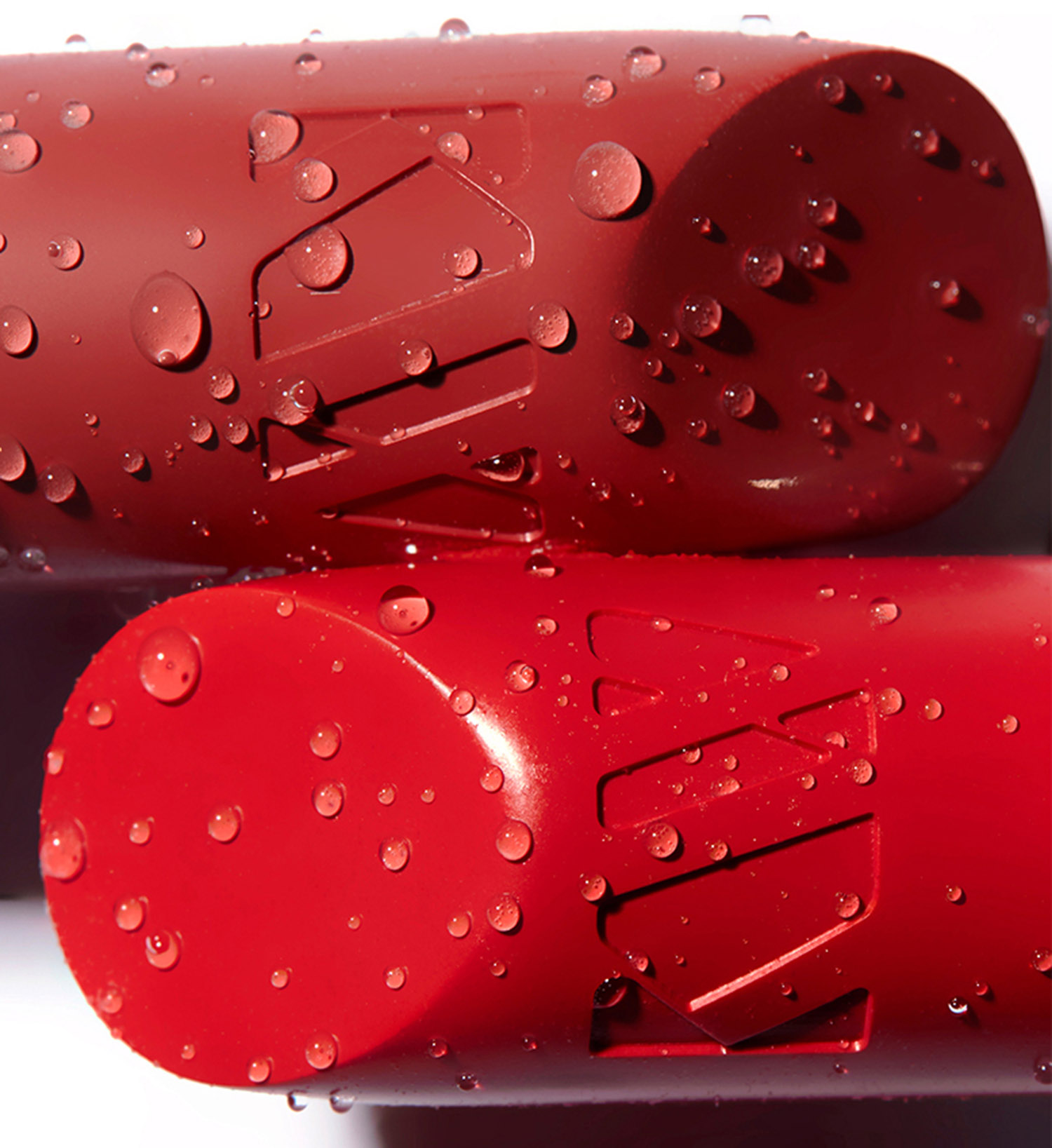 KMA stylist Sara Wacksman designs set for macro texture photo of Kjaer Weis lipstick with water droplets 