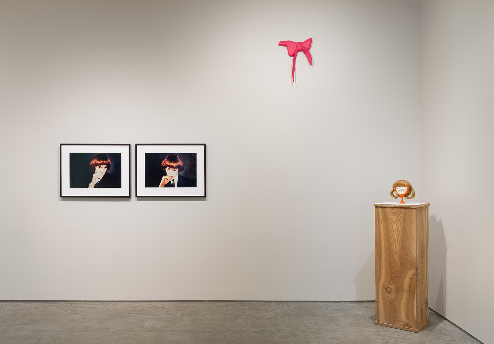 (From left to right) Richard Prince and Cindy Sherman, Double Self Portrait, 1980. Ektacolor photographs, 20 x 24 inches each; Trish Tillman, Character Arc 13, 2024. Hand-dyed leather, UV print on leather, thread, wood, foam, metal hardware, 15 x 14.5 x 1 inches; Greer Lankton, If you can pass for a girl, 1989. Wig, mirror, black marker, 10 x 7 x 6 inches. Photo by Etienne Frossard.