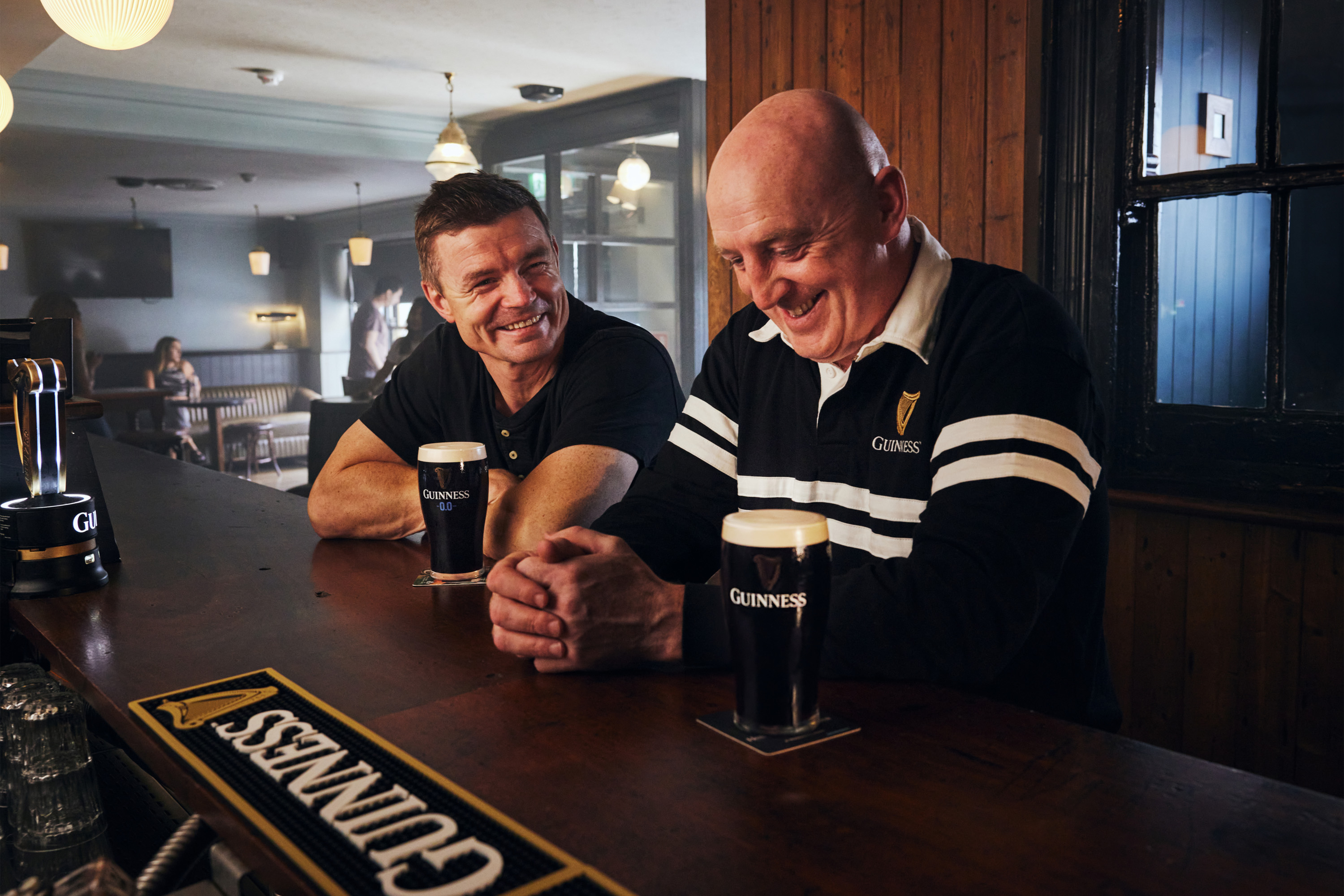 Brian O'Driscoll and Keith Wood, Irish rugby legends photographed by Dublin based lifestyle, fashion, and advertising photographer Alex Sheridan for Guinness Don't Jinx It campaign, capturing authentic energy and real moments
