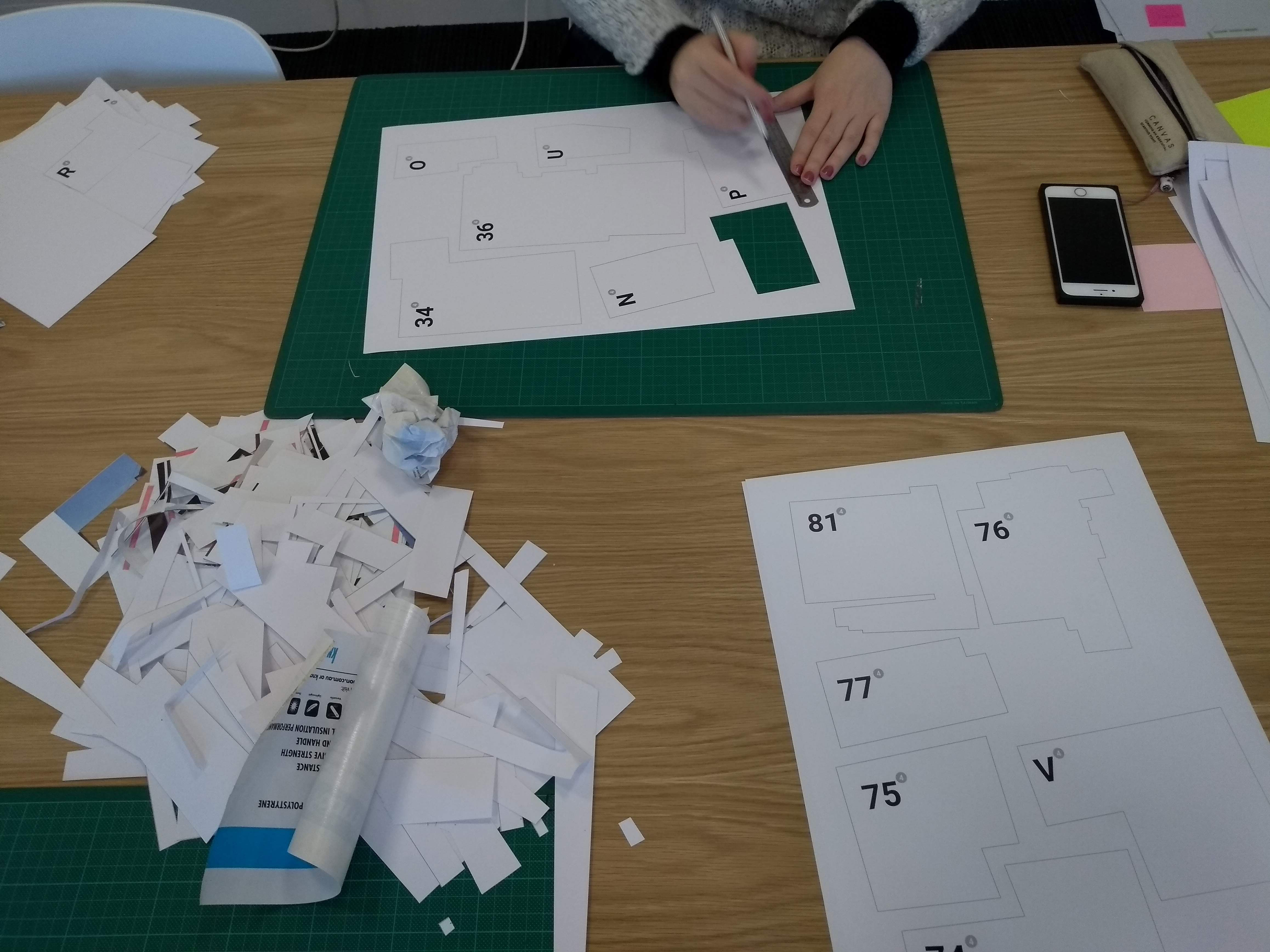 ...cutting, taping, gluing...