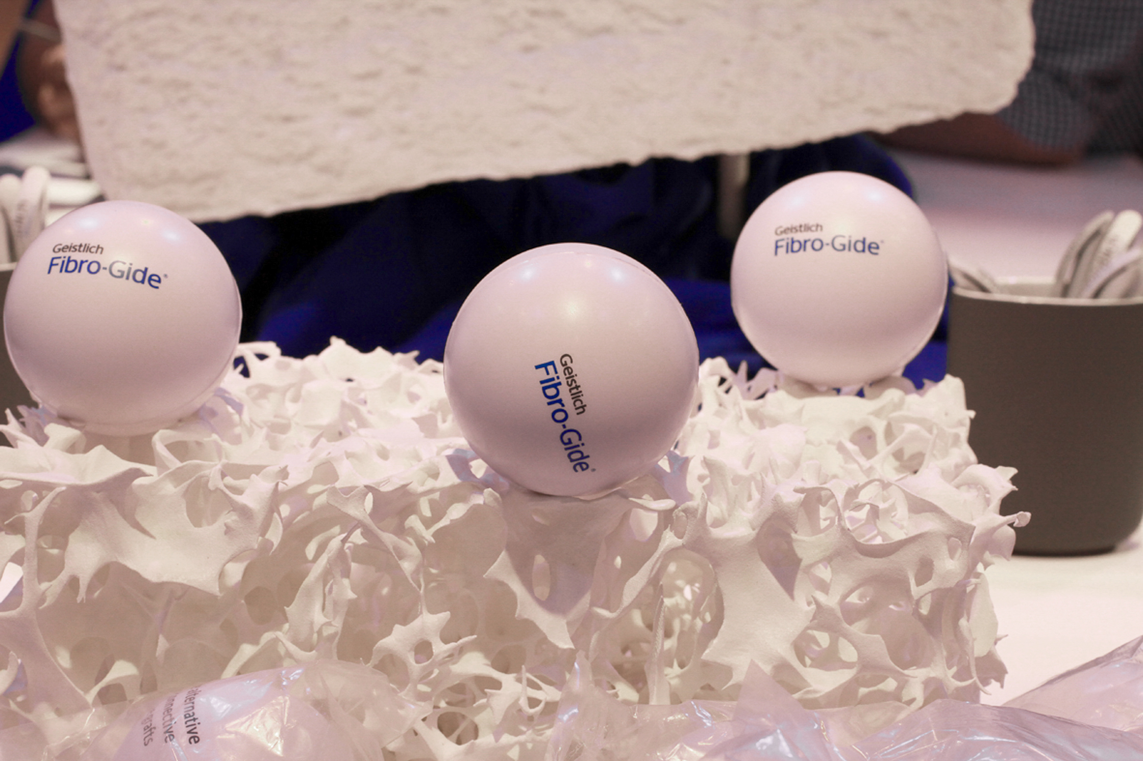 3D-printed microstructure of Geistlich Fibro-Gide, with added branding for a marketing fair.