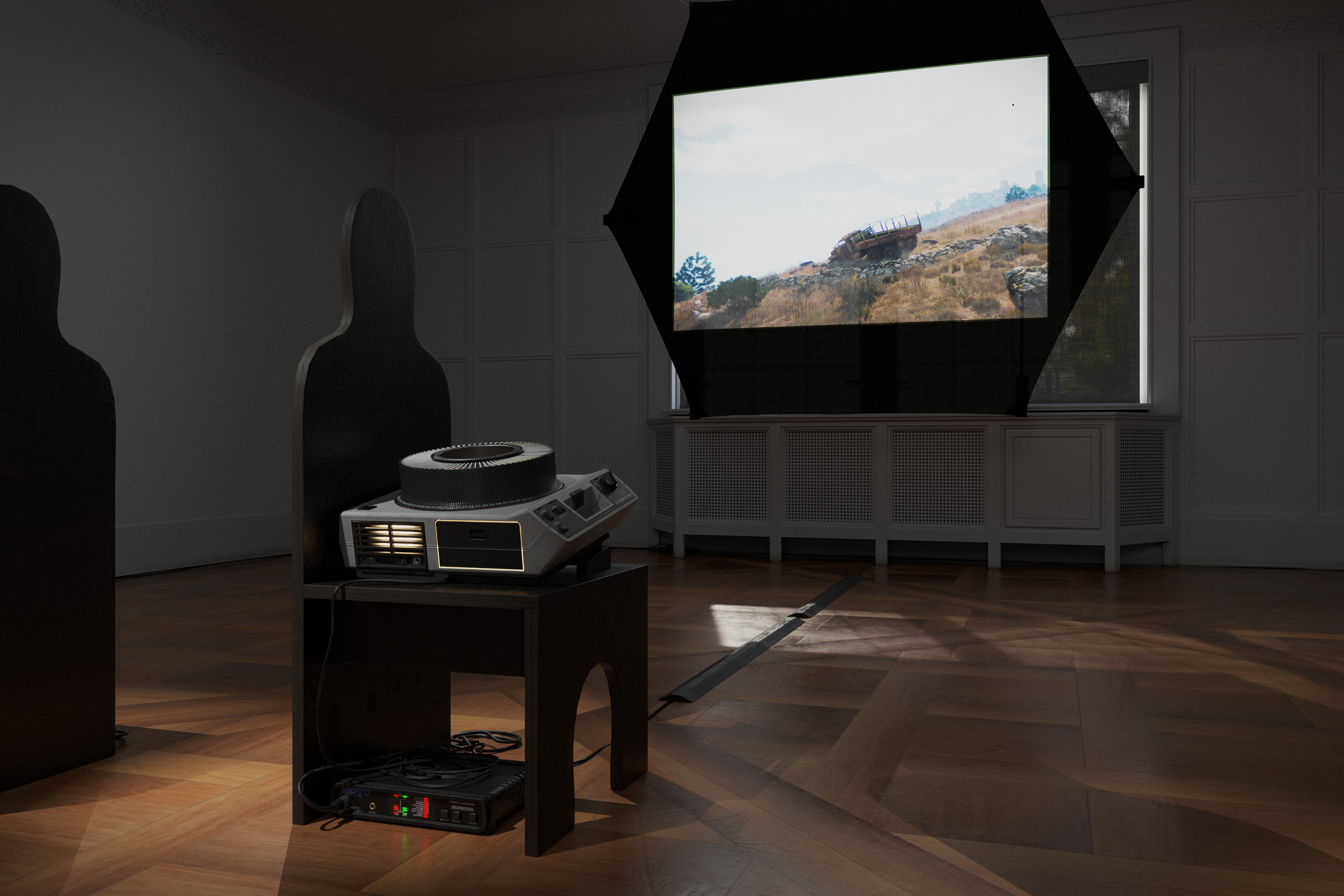 Simulation Sickness, 2025, slide projector, target gong with stand, ethically-sourced painted turtle shell, digital wind instruments, tactile transducers, rokkaku kite, aircraft cable, tape, wiring, amplifiers, midi interface, patch cords, hardware, dimensions variable