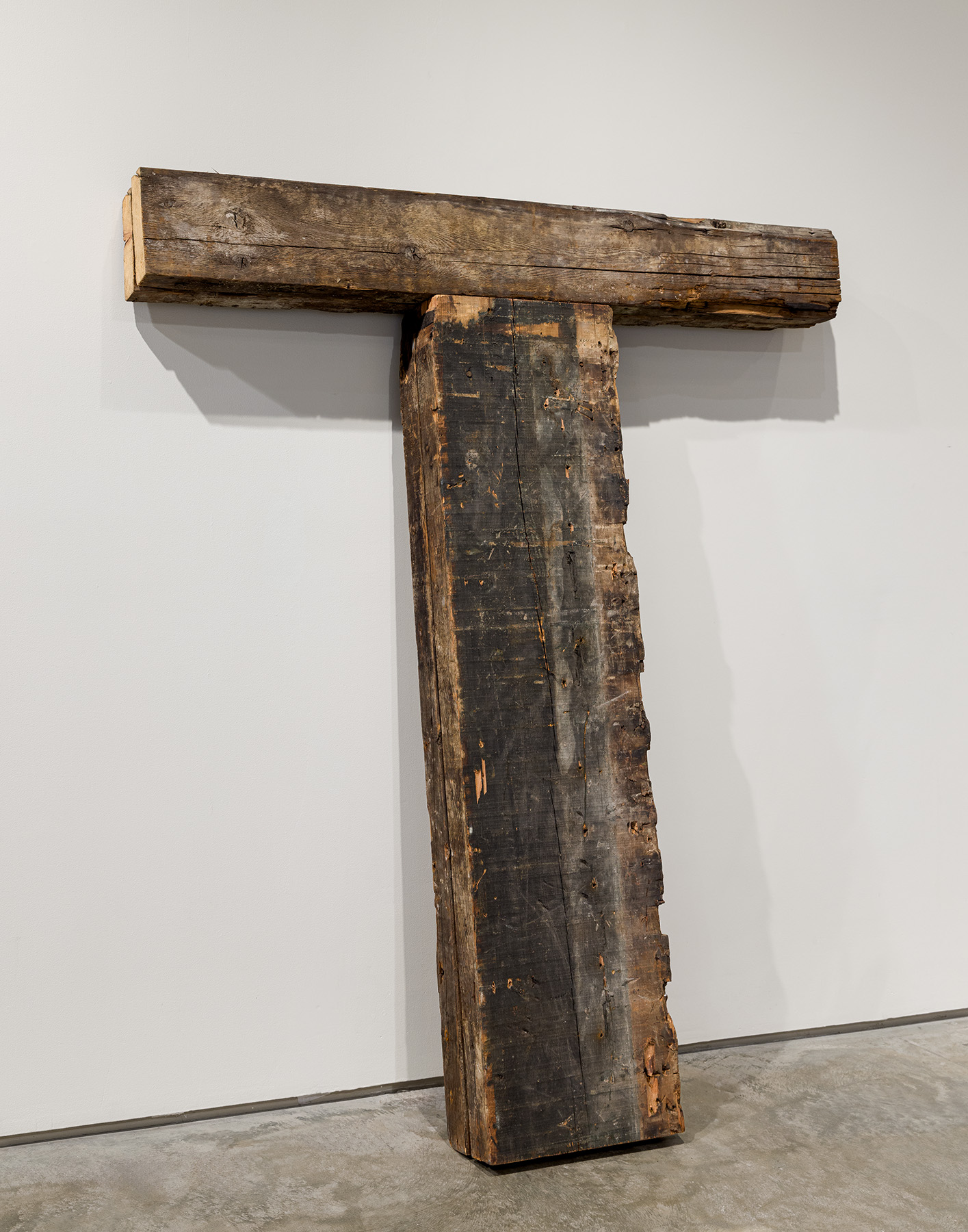 Kris Grey, Capital T, 2025. Salvaged wooden joists from Stonewall National Monument Visitor Center, 75 x 60 x 6 inches. Courtesy of the artist.Photo by Etienne Frossard.