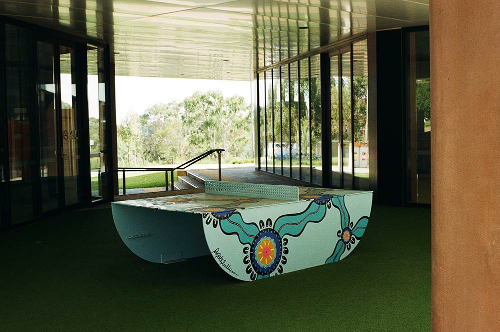 A POPP outdoor table tennis table with custom artwork by Danielle Mate