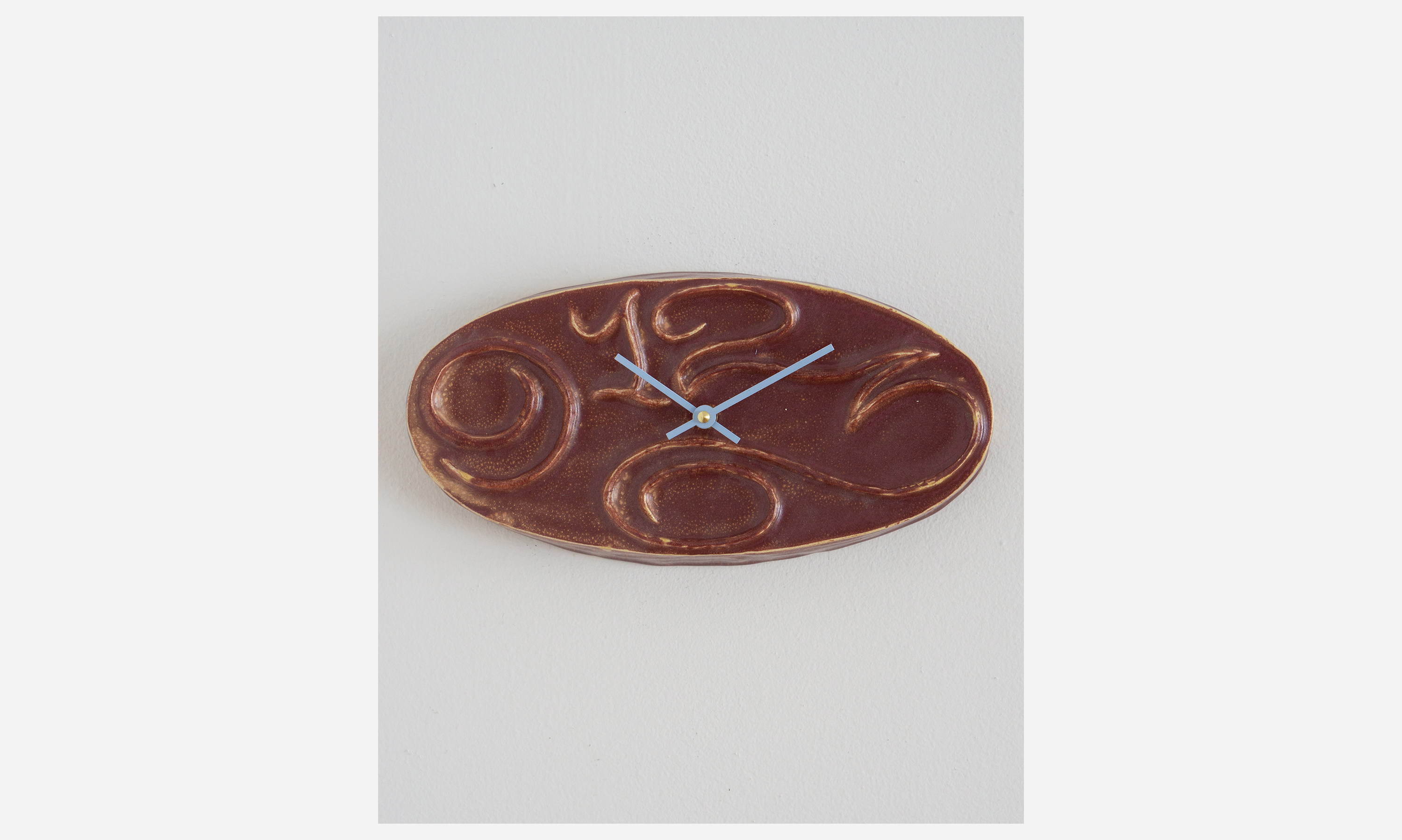 4 Numeral Oval Clock, glazed ceramic, 11 x 5.5 x 2 inches, 2024