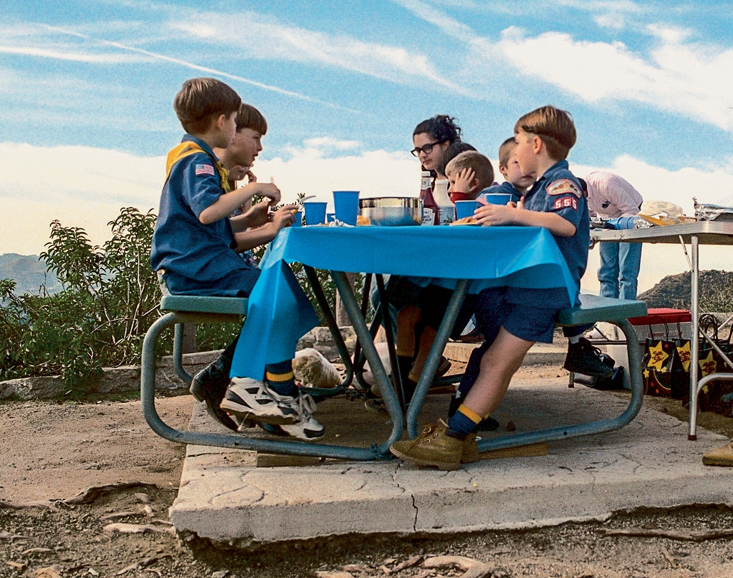Self Portrait with Cub Scouts, Griffith Park, Los Angeles, 1995. C-print; 10 &frac34; &times; 11 inches