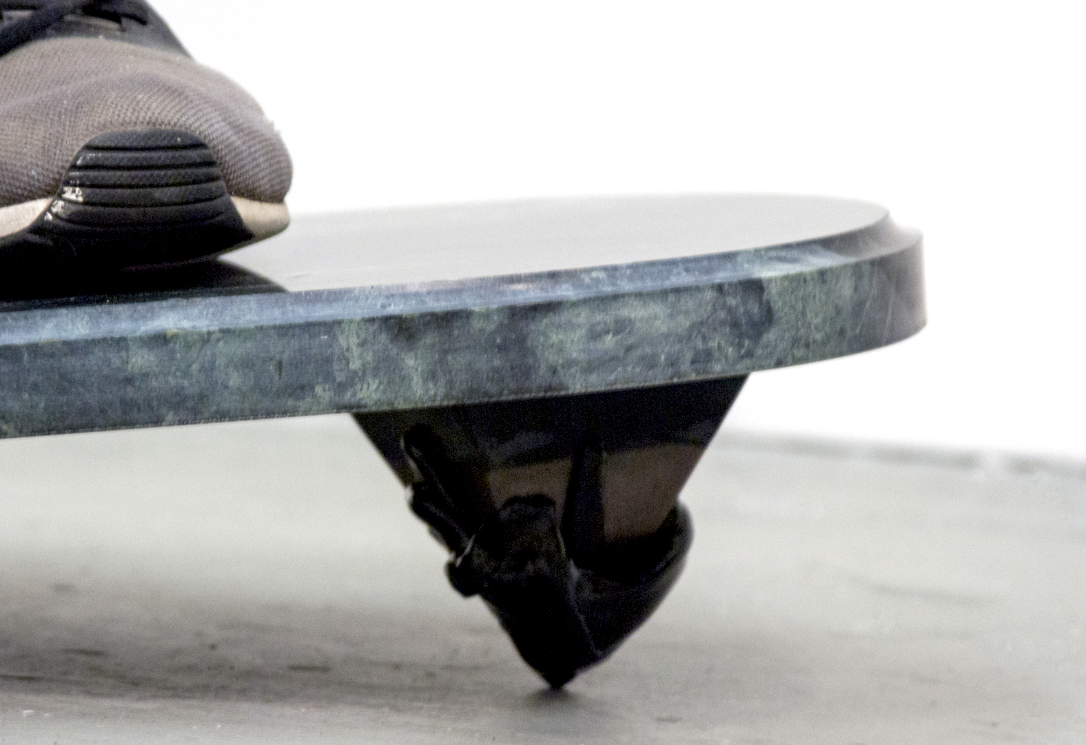 Detail of  Small Obstruction (Putting It Out There), 2018, 30"x28"x10". Sneakers, marble, epoxy resin, urethane resin, aluminum, oil on canvas 