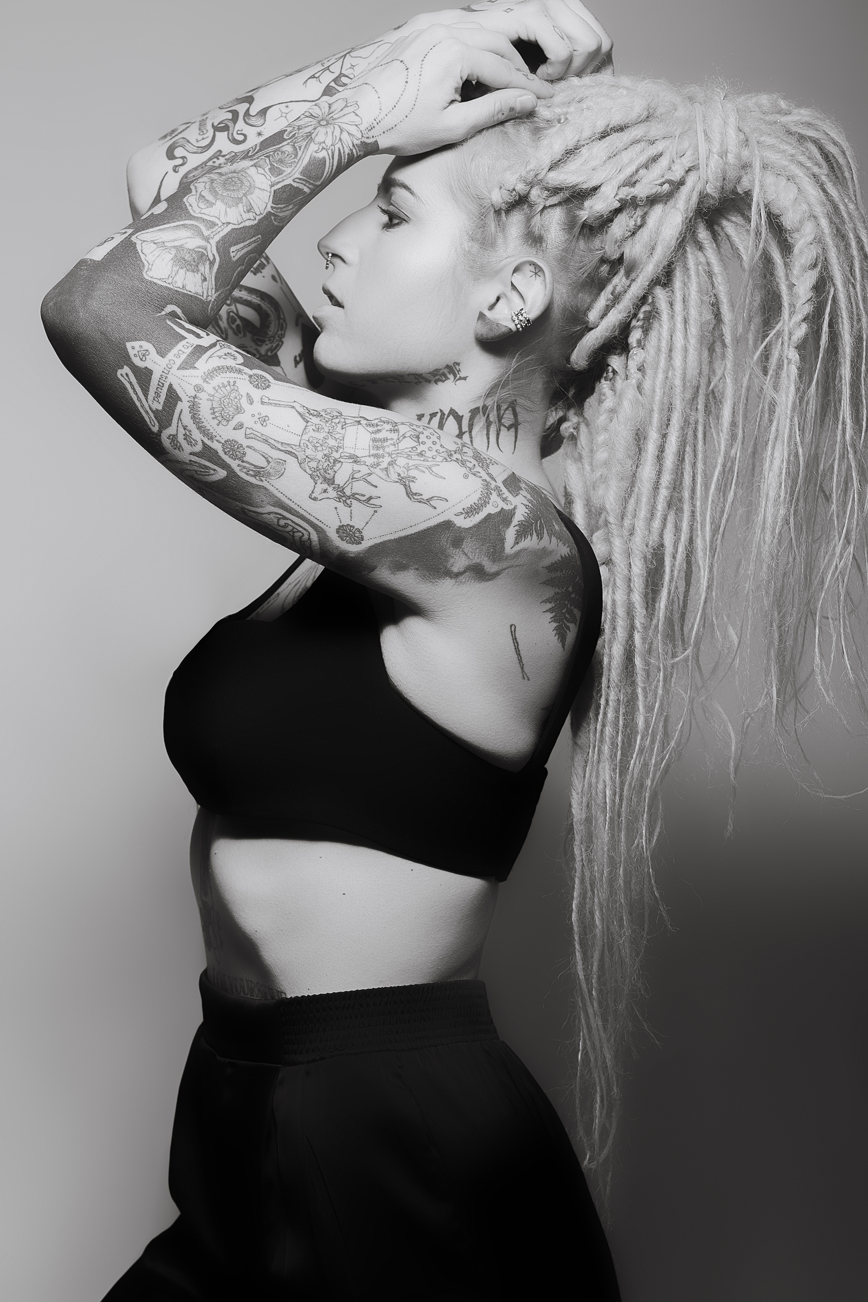 Professional photography services for agency model portfolios and Tattoo magazine.
