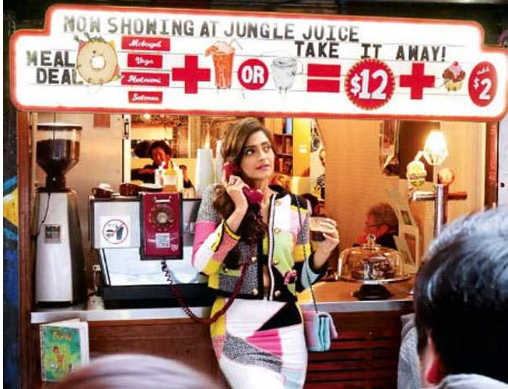Sign for Jungle Juice Cafe, featured in Vogue India