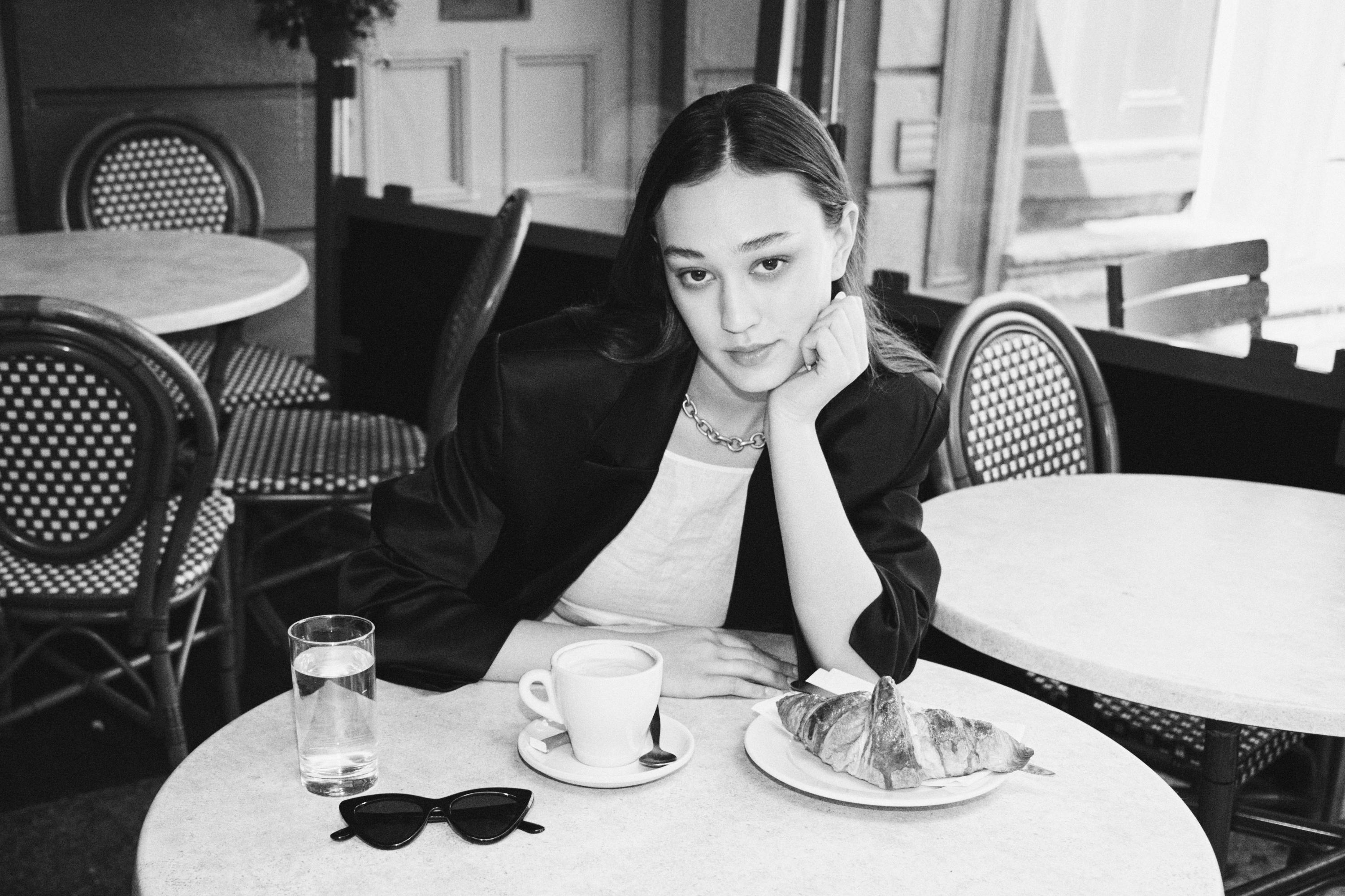 Luxurious fashion editorial photoshoot in Dublin, Ireland, featuring a stunning model in vintage clothes. Photographed in the city's trendy French cafes, this photography showcases the elegance of high-end fashion and the charm of vintage clothing. Captured by a skilled photographer, this editorial is sure to impress.