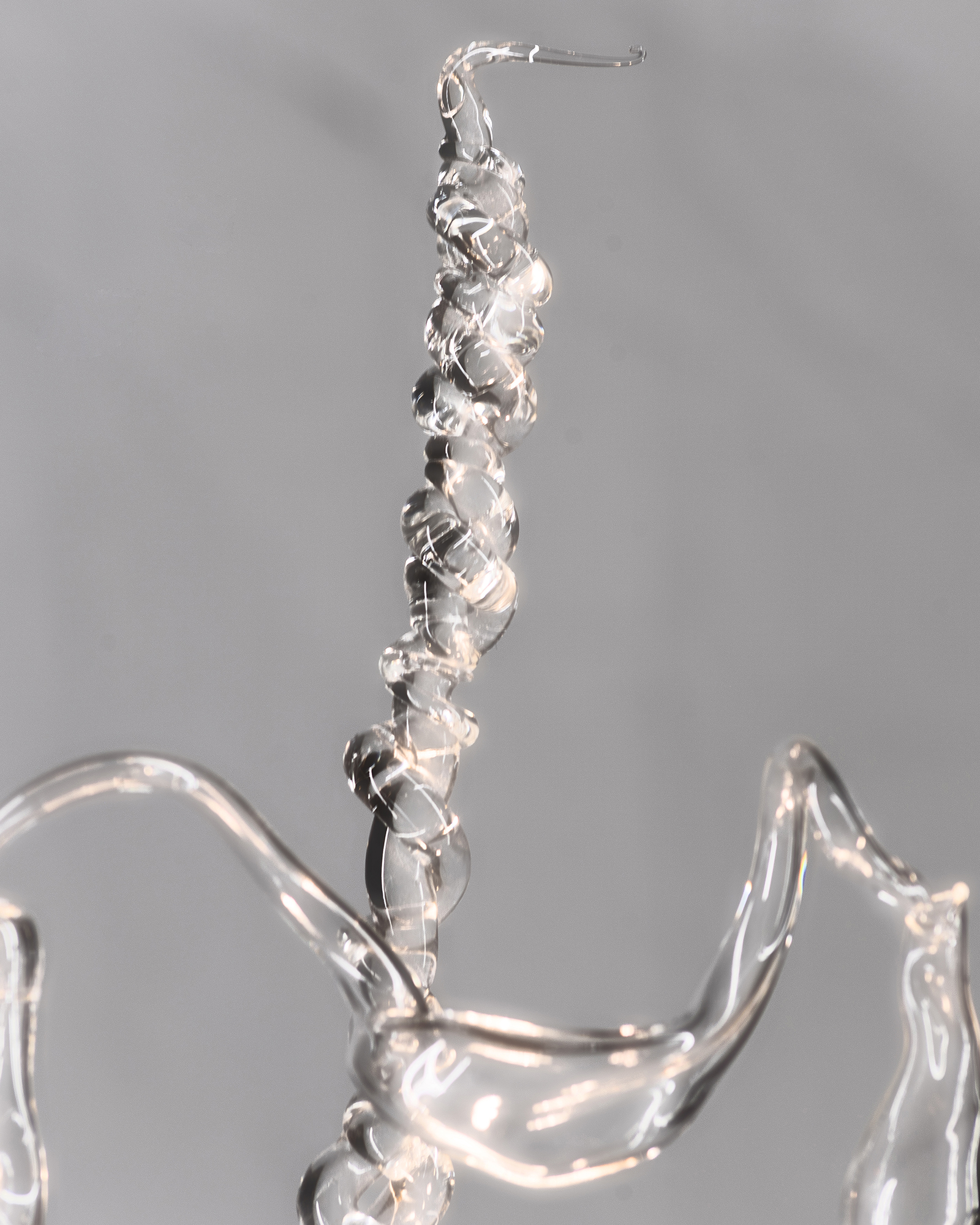 Detail of Beroe Ovata (Dedal) lamp made with blown glass from Plaja Studio, Medi Terraneum collection.